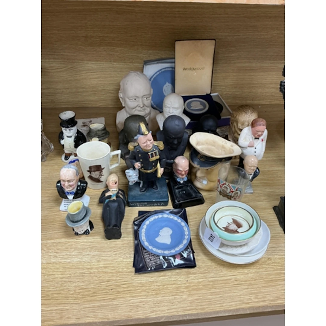 A collection of Winston Churchill memorabilia to include bus...