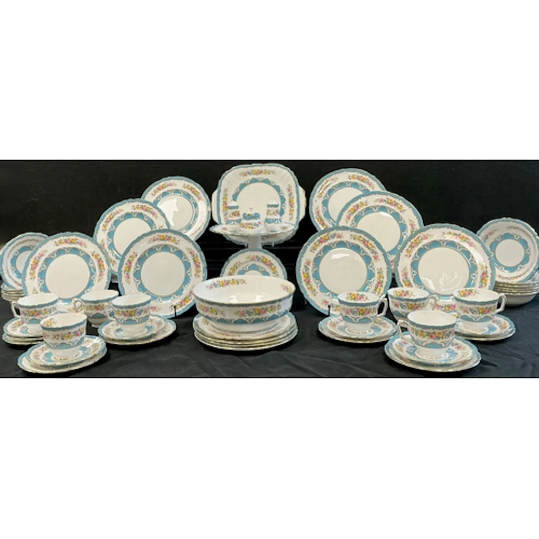 A Crown Staffordshire lyric Tunis blue tea and desert servic...