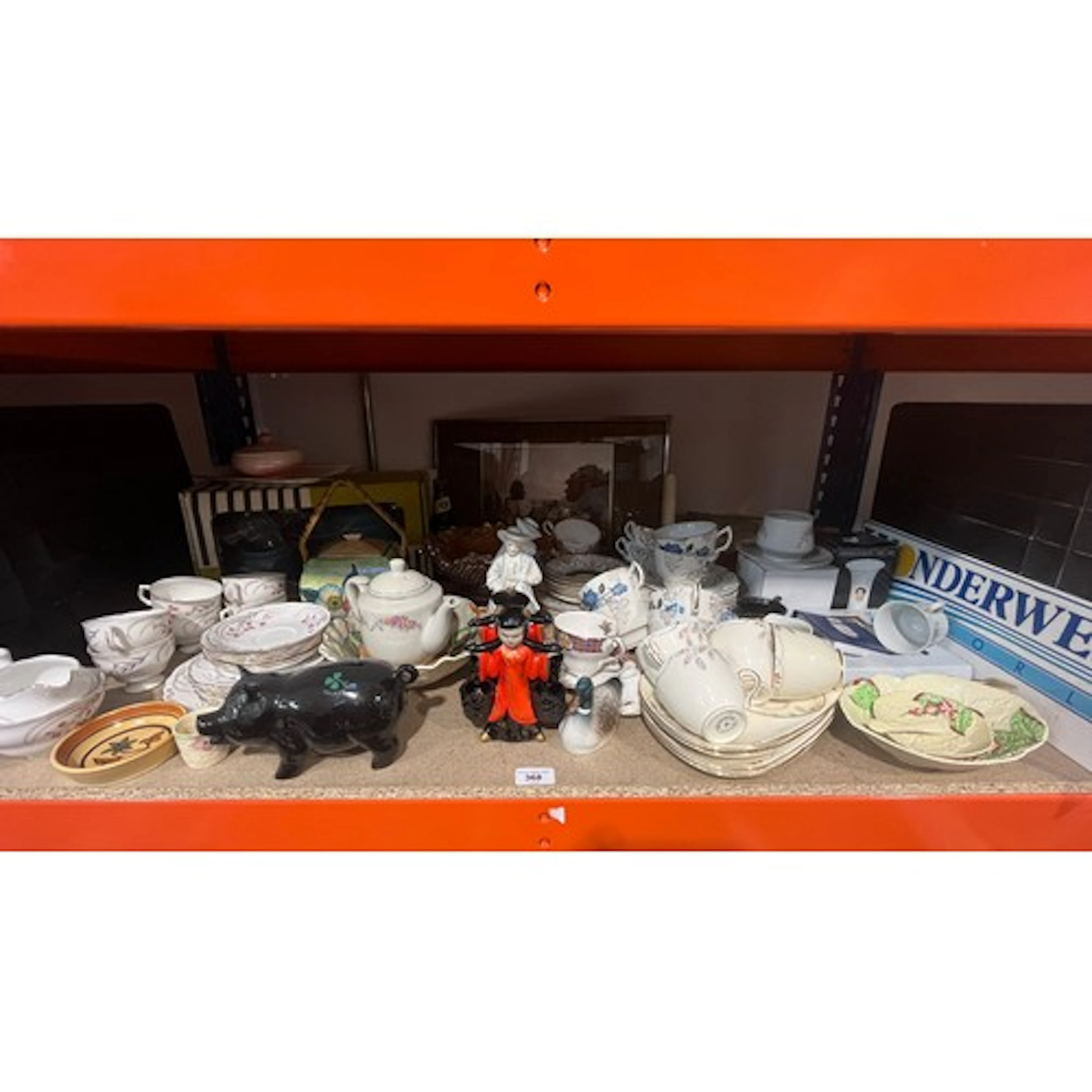 Shelf containing decorative ceramics to include Sadler boxed...