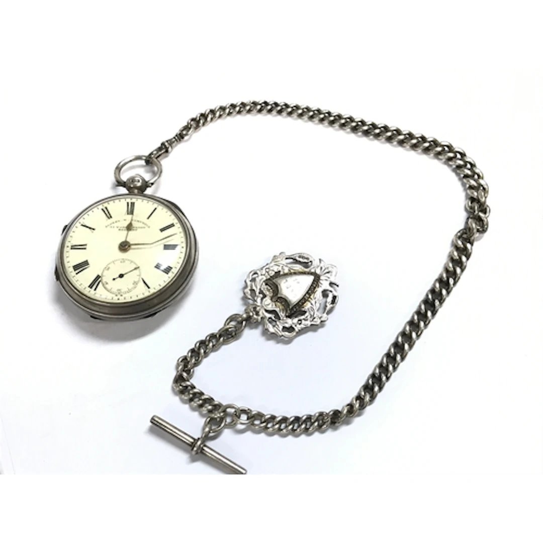 A silver hallmarked Sidney W. Campbell pocket watch with an ...