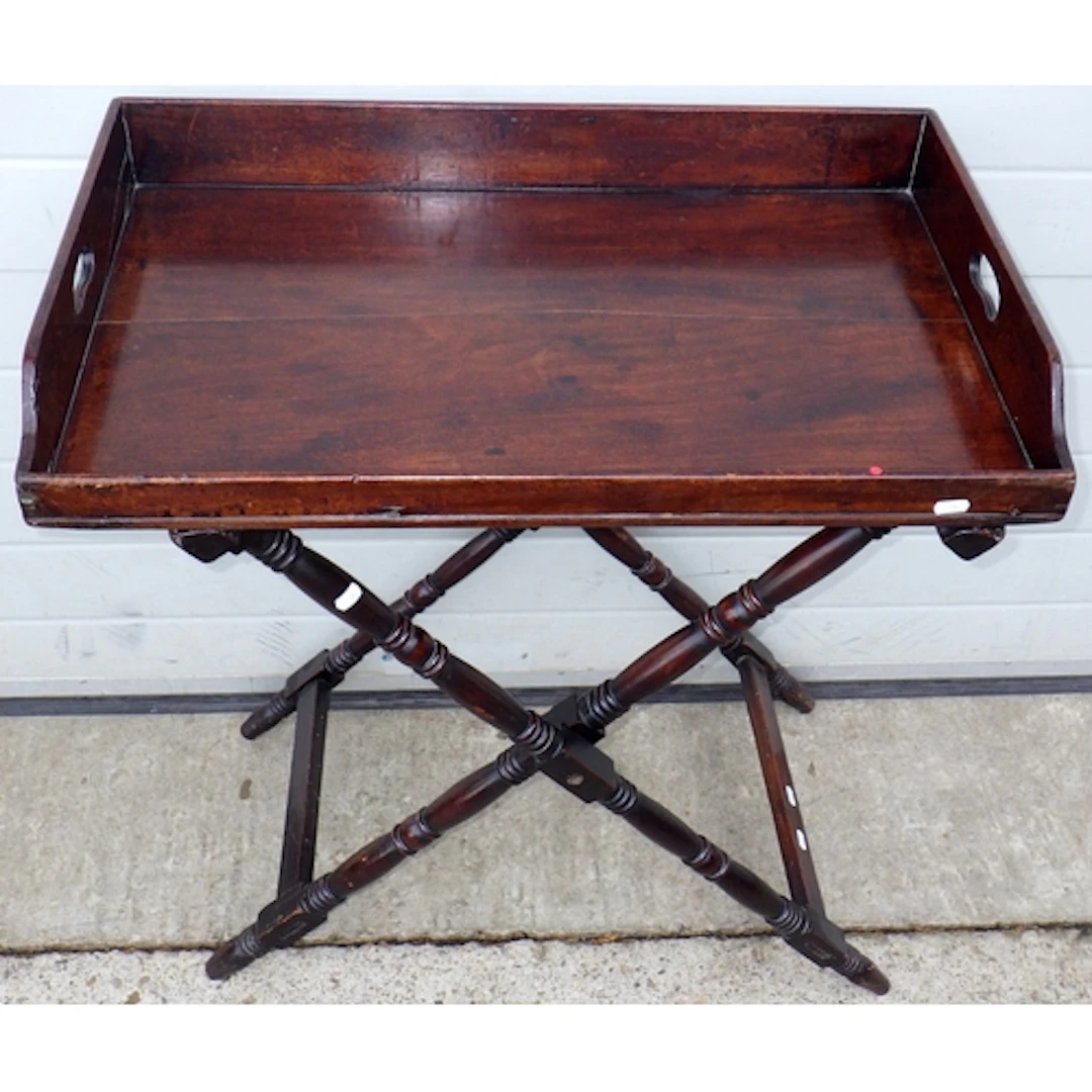 A Regency mahogany butlers tray, 77cm wide on turned stand, ...