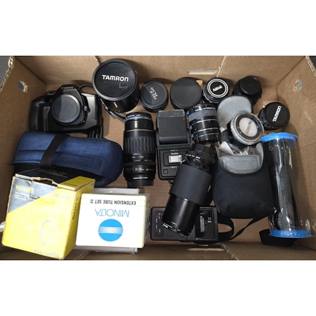A Canon EOS 650 camera body, a Cannon 100-300mm lens, Tamron...