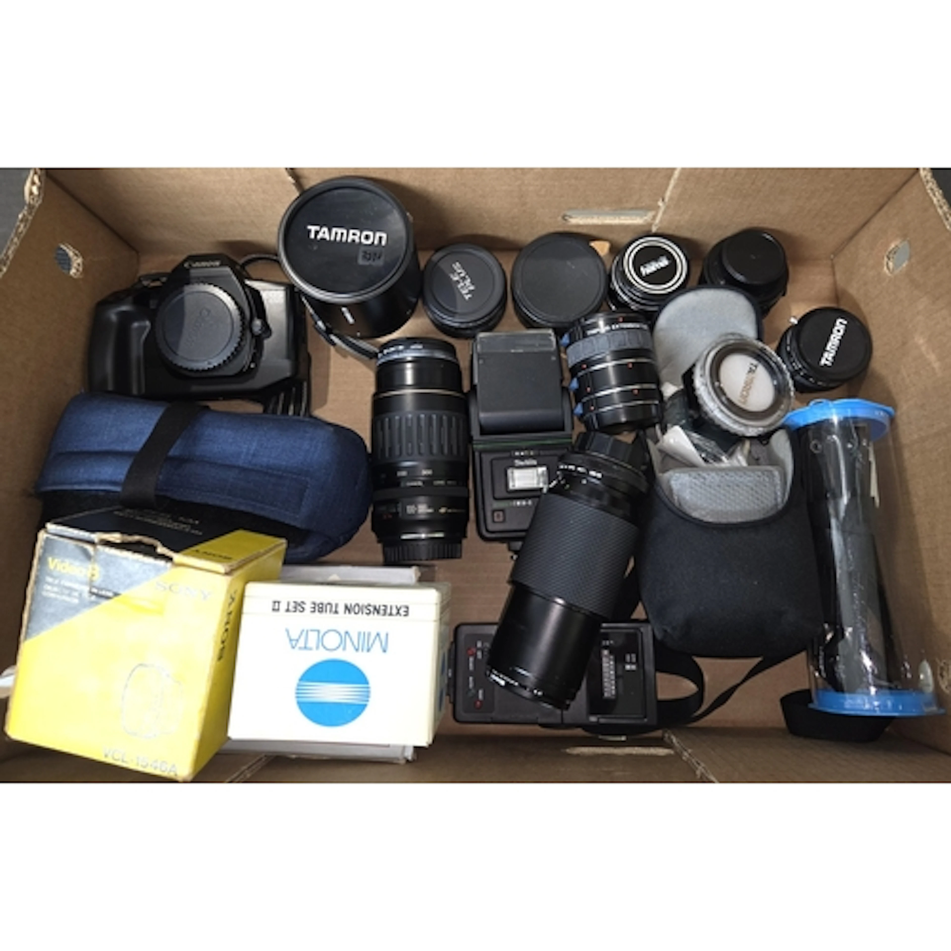 A Canon EOS 650 camera body, a Cannon 100-300mm lens, Tamron...