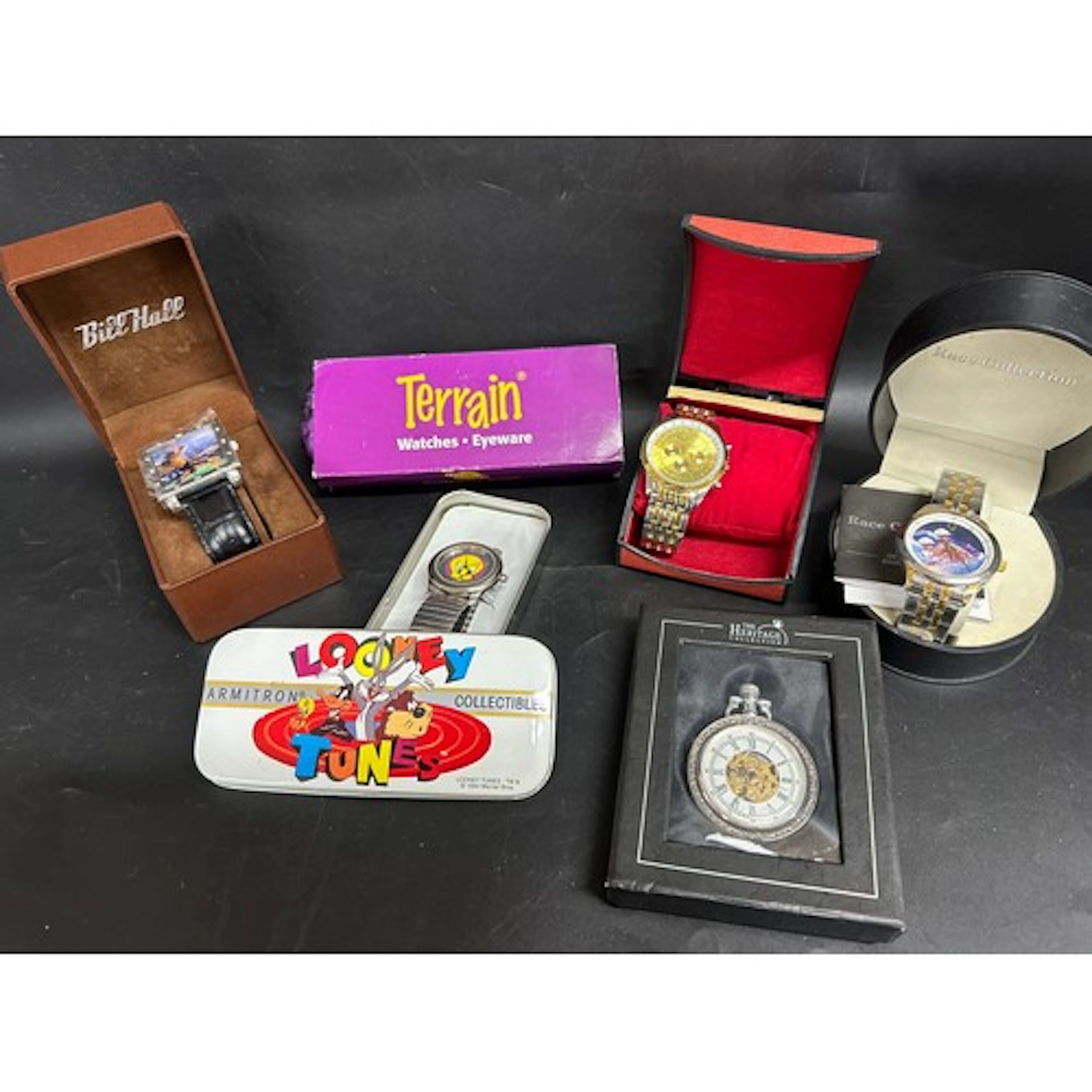 Six watches including Bill Hall, Terrain, Looney Tunes, etc.