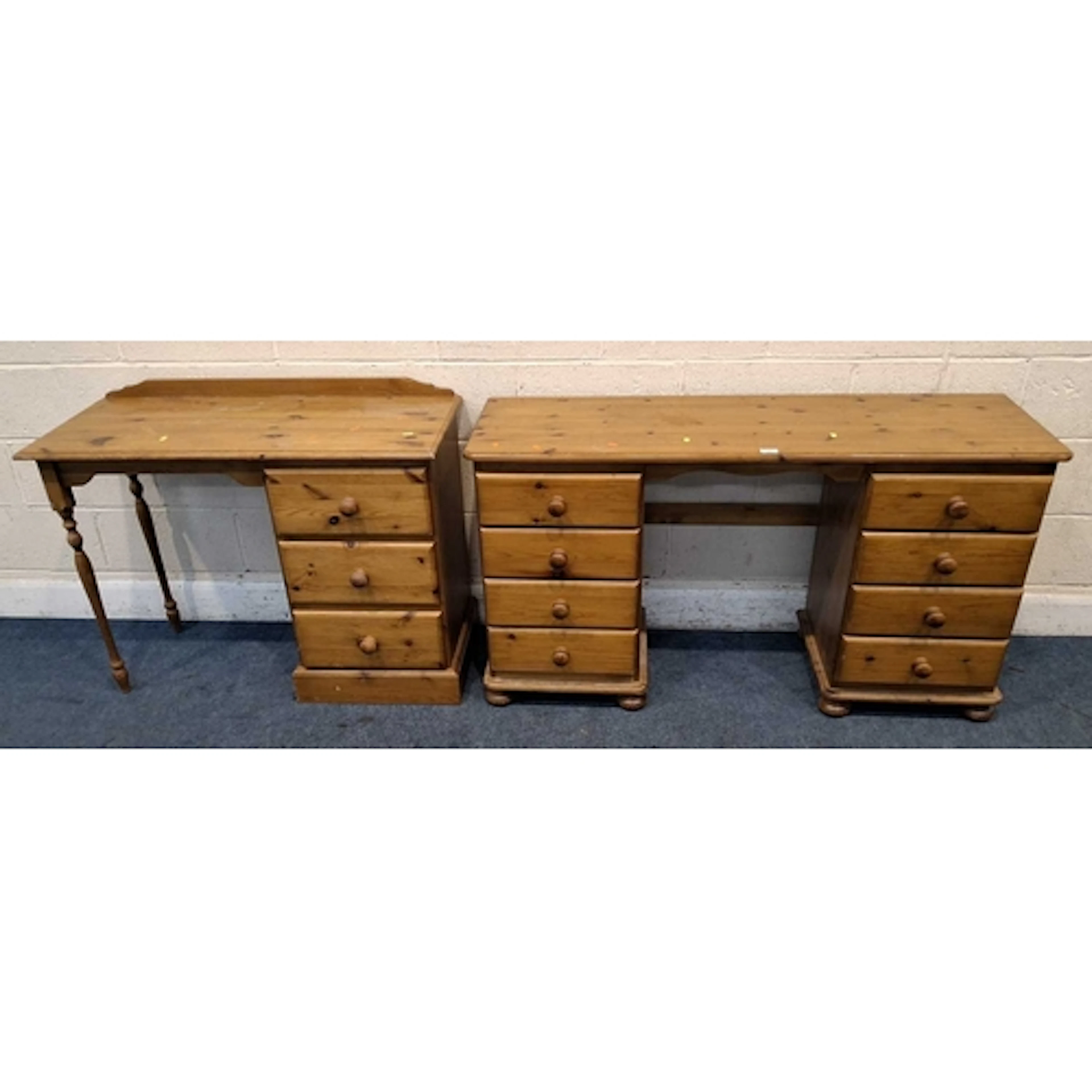 TWO MODERN PINE DRESSING TABLES, the larger table fitted wit...