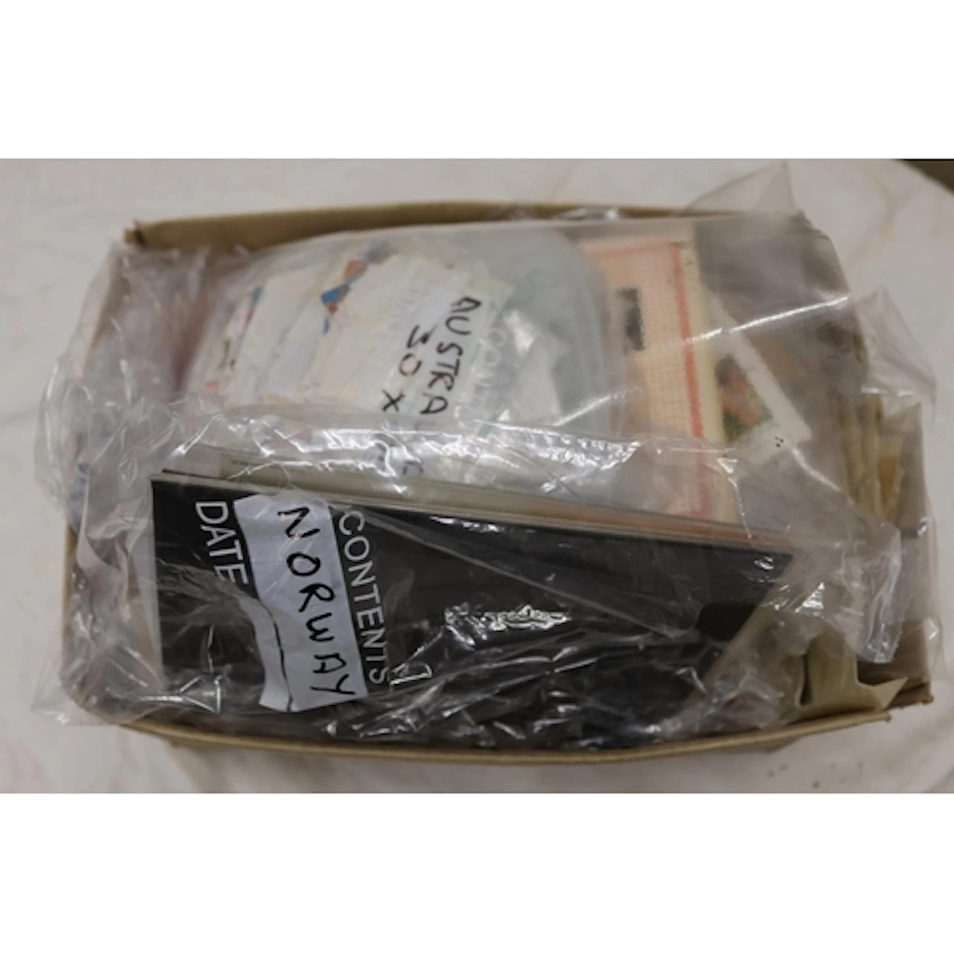 20th century used stamp collection sorted into bags by count...