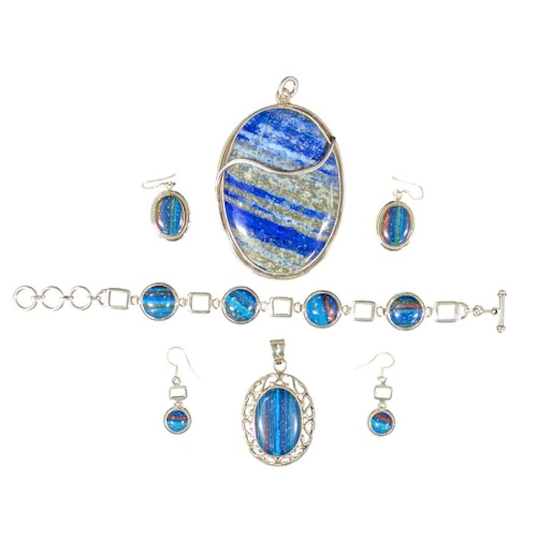 A rainbow calsilica and silver pendant, four panel bracelet,...