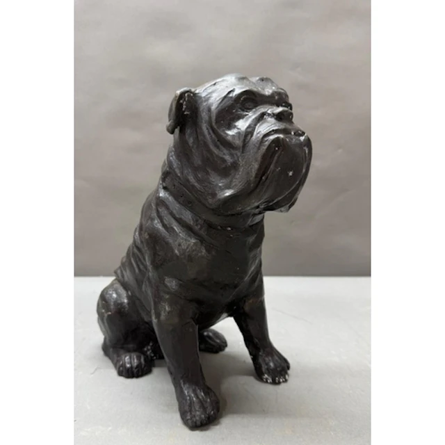 A bronzed metal sculpture of a seated bulldog. Height 29cms...