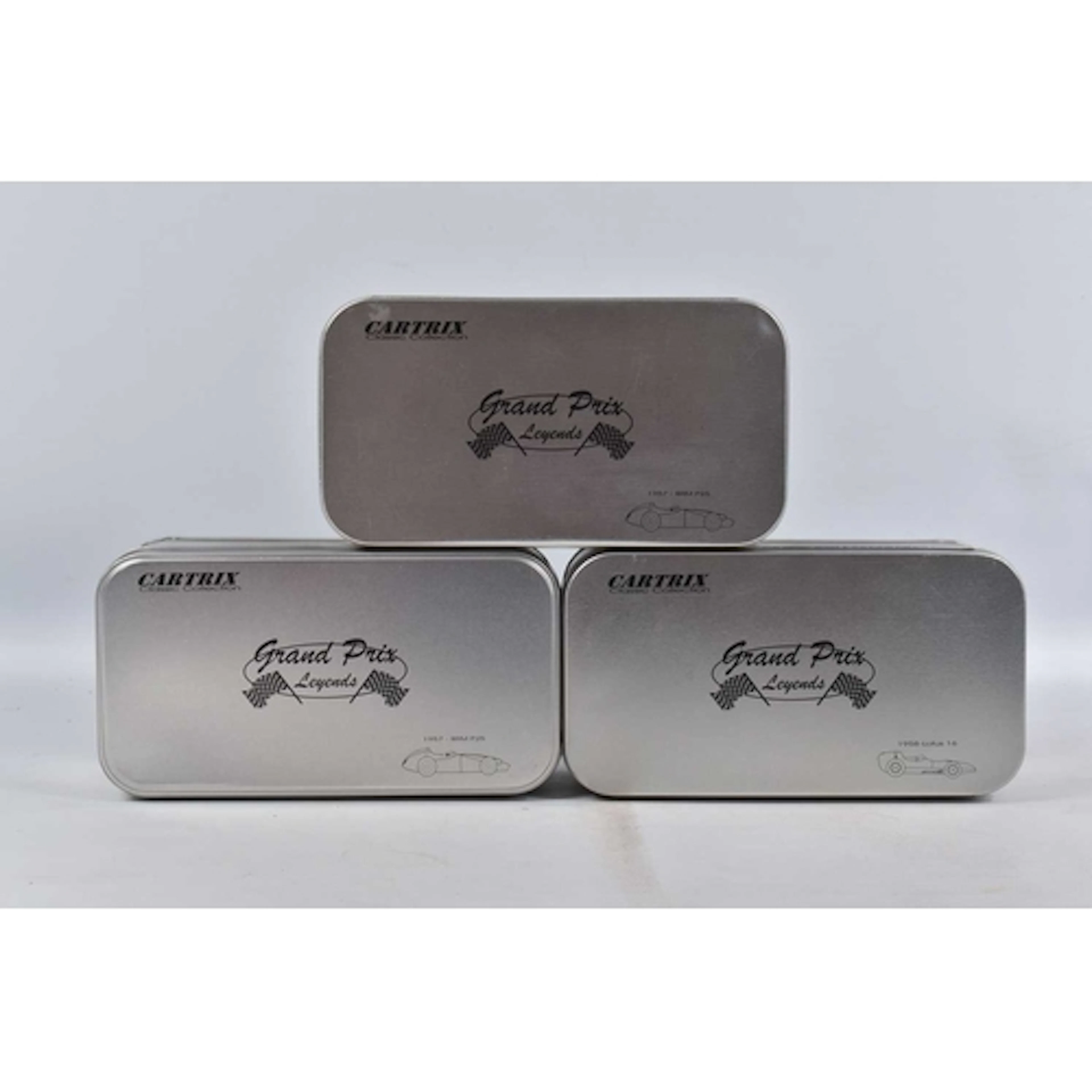 THREE CARTRIX GRAND PRIX LEGENDS SLOT CAR MODEL VEHICLES, to...