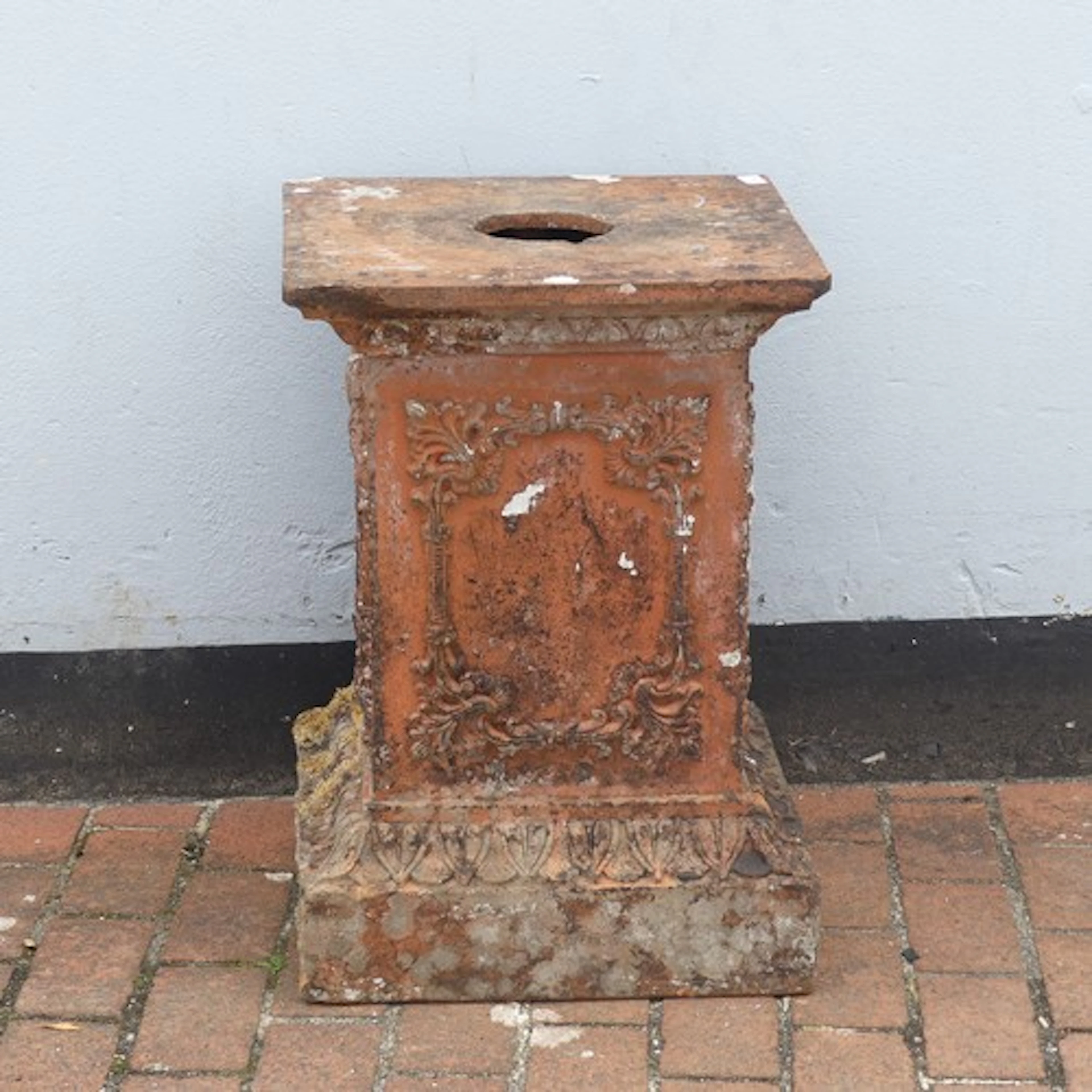 An antique weathered terracotta square Garden Plinth, each s...