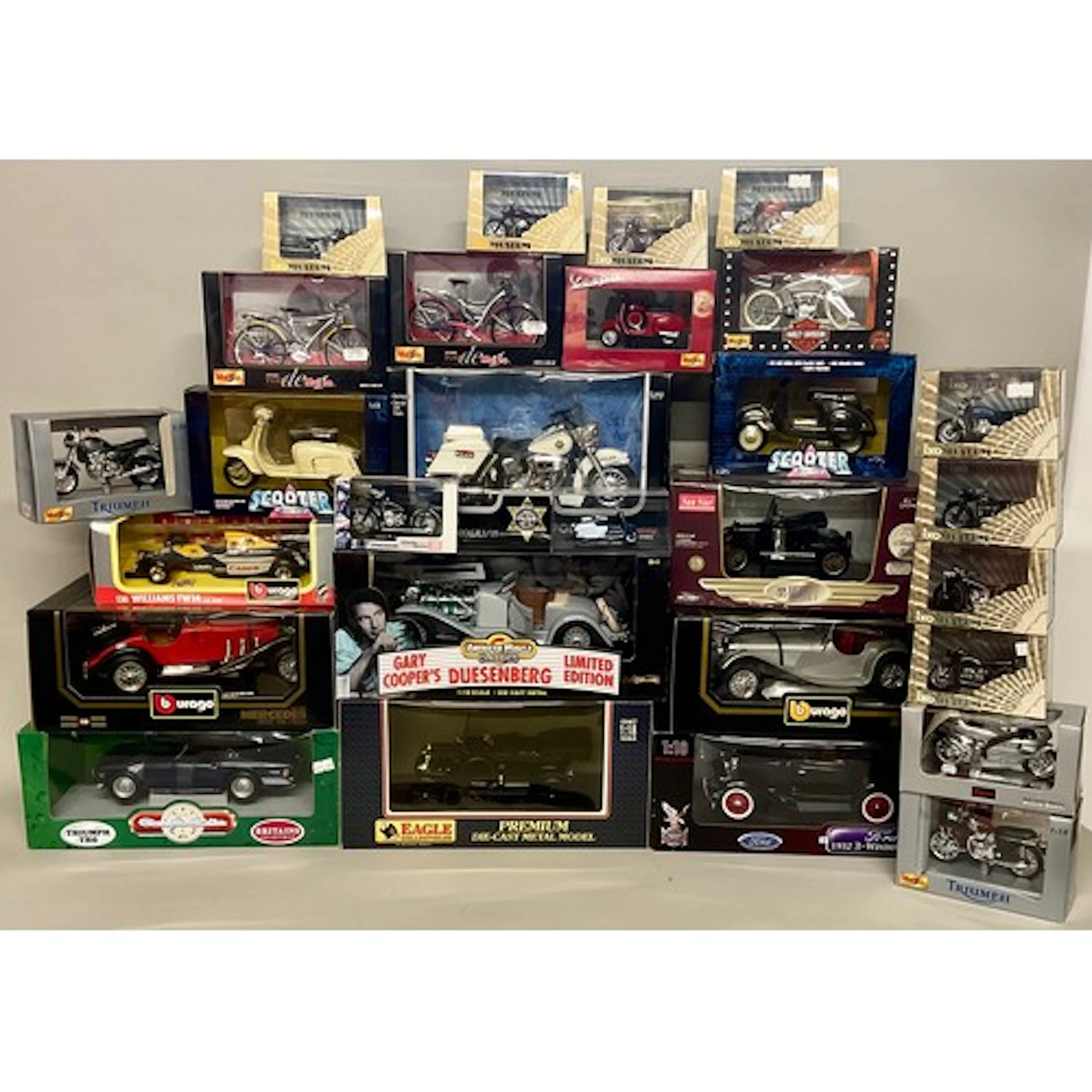 Diecast Vehicles - A quantity of boxed diecast vehicles to i...