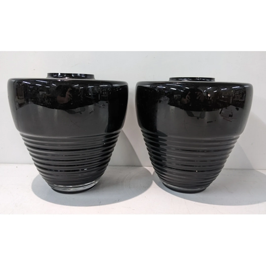A pair of Calligaris glass vases, each of tapering form with...