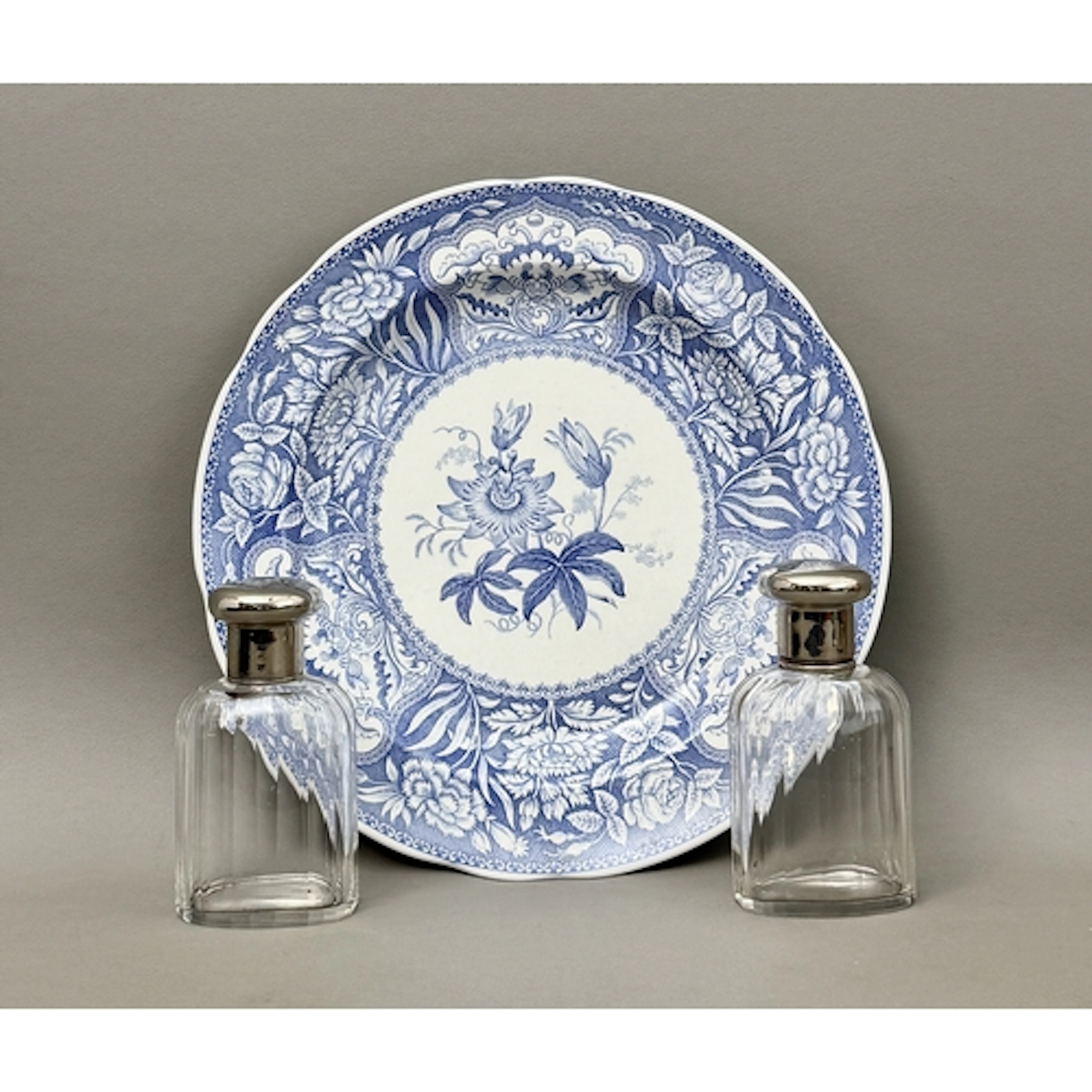 A mixed lot - comprising a pair of fluted, cut glass perfume...