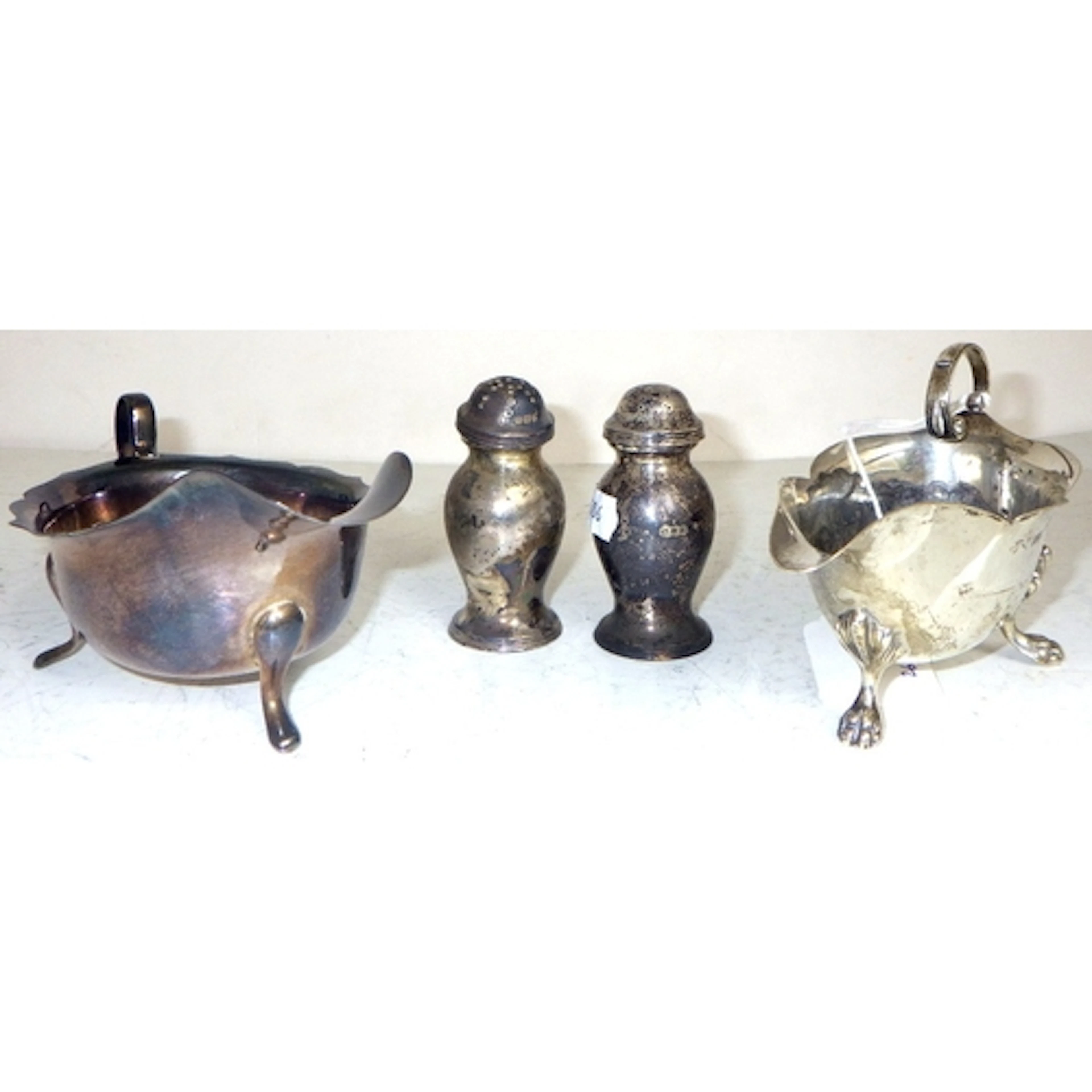 Two silver sauce boats and two pepper pots, 260g gross