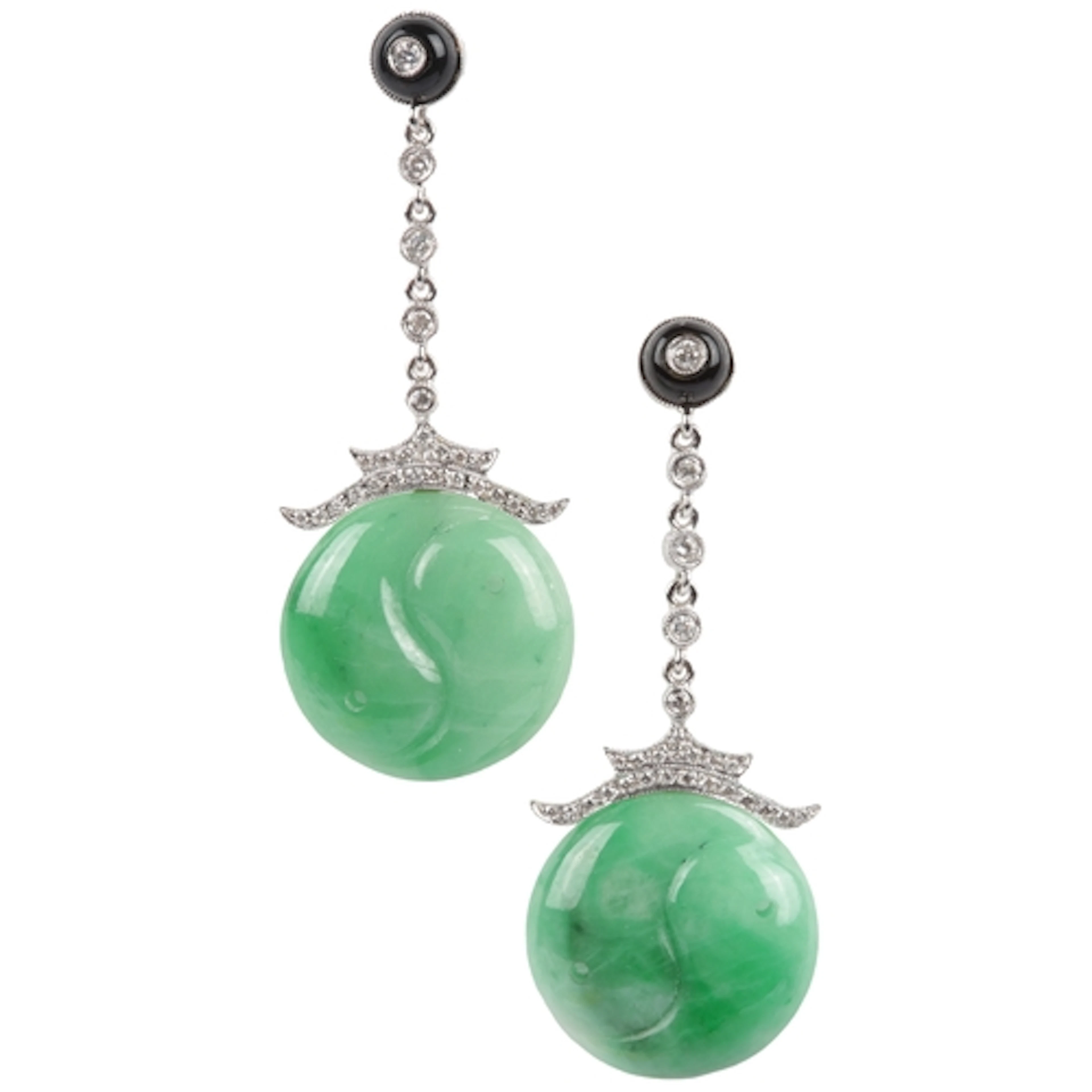 A pair of modern Art Deco-style onyx, diamond and jadeite ea...