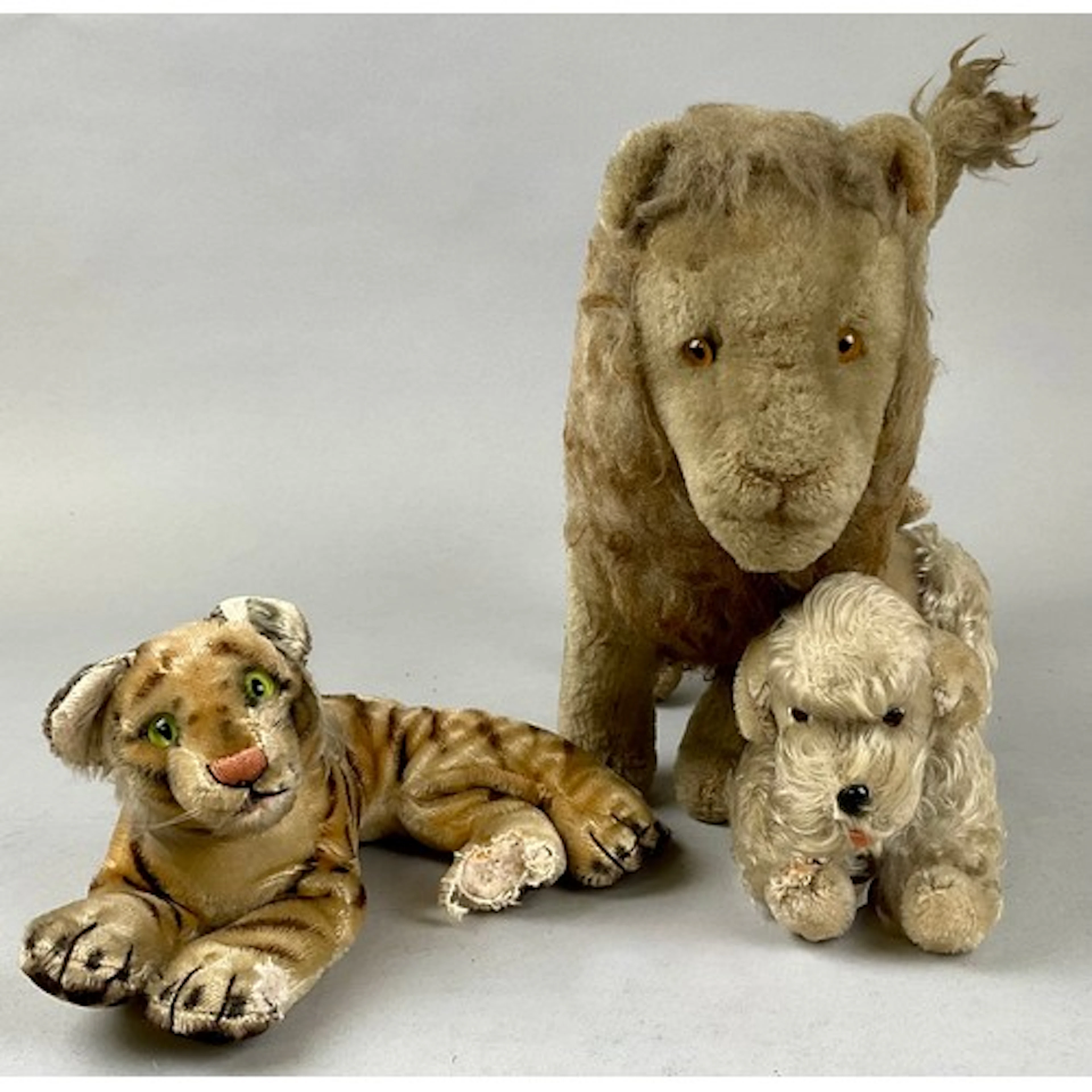 A mid-century Steiff mohair poodle, articulated legs, 23cm h...