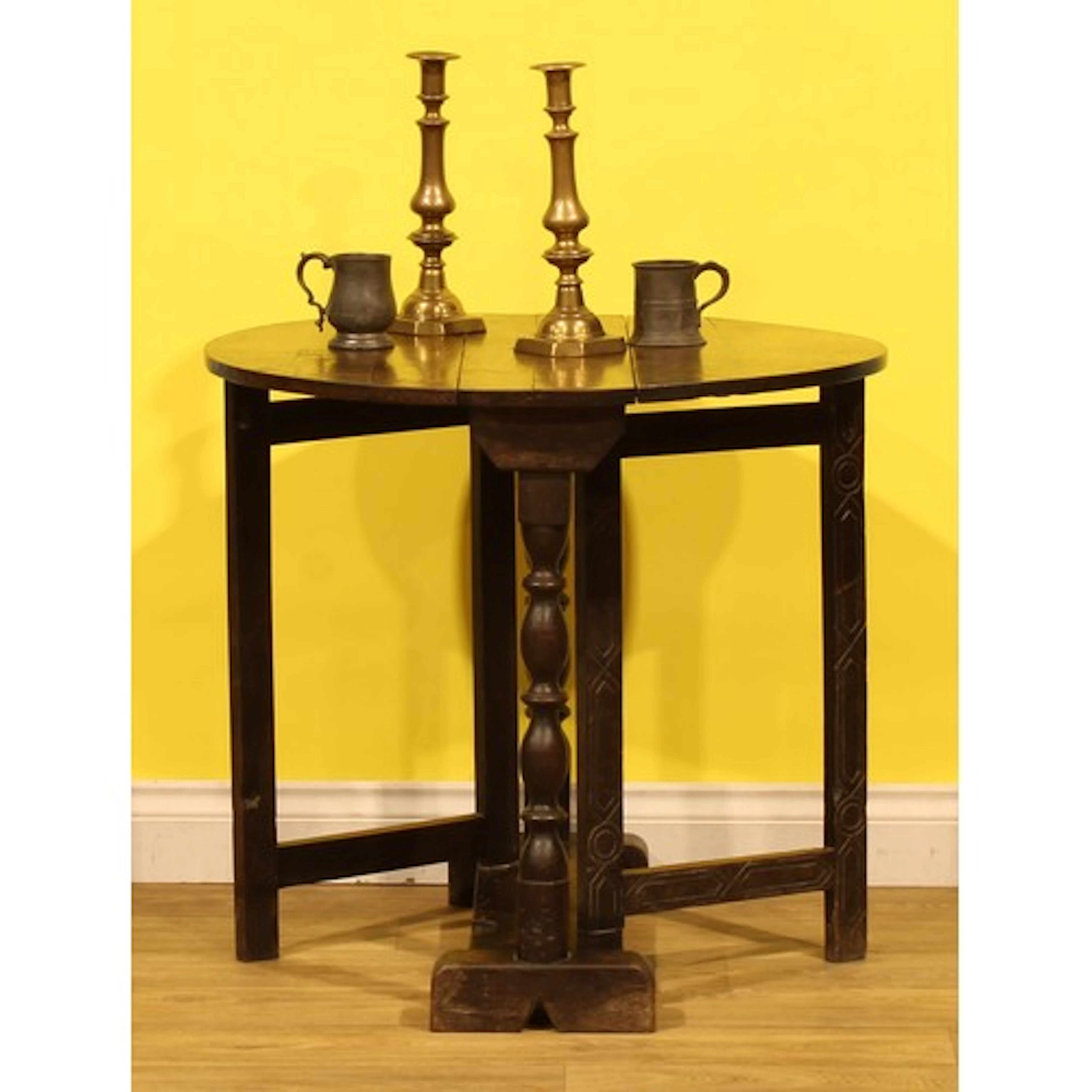 A Charles II oak joined gateleg table, turned supports, each...