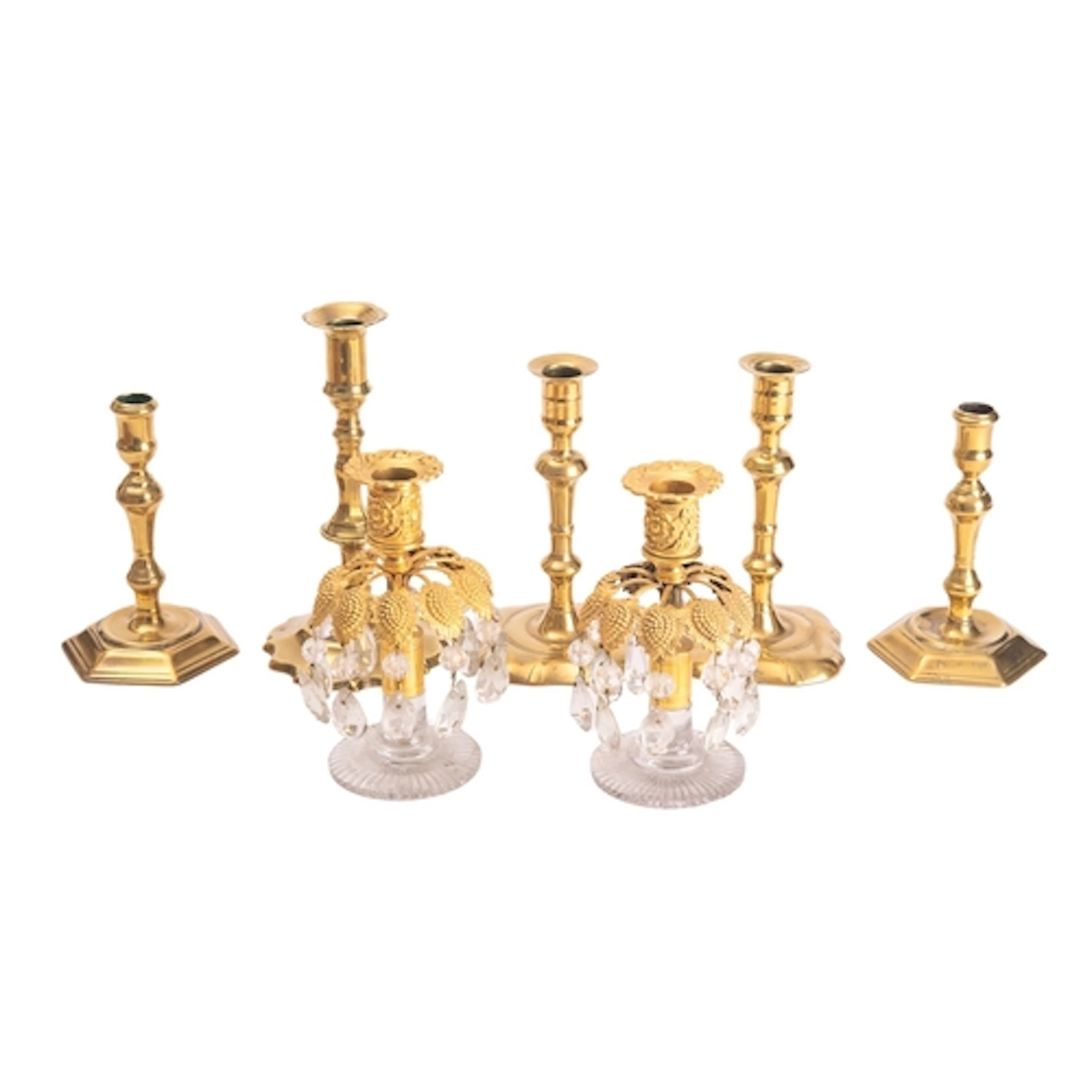 Two pairs of George II brass candlesticks, mid 18th century;...