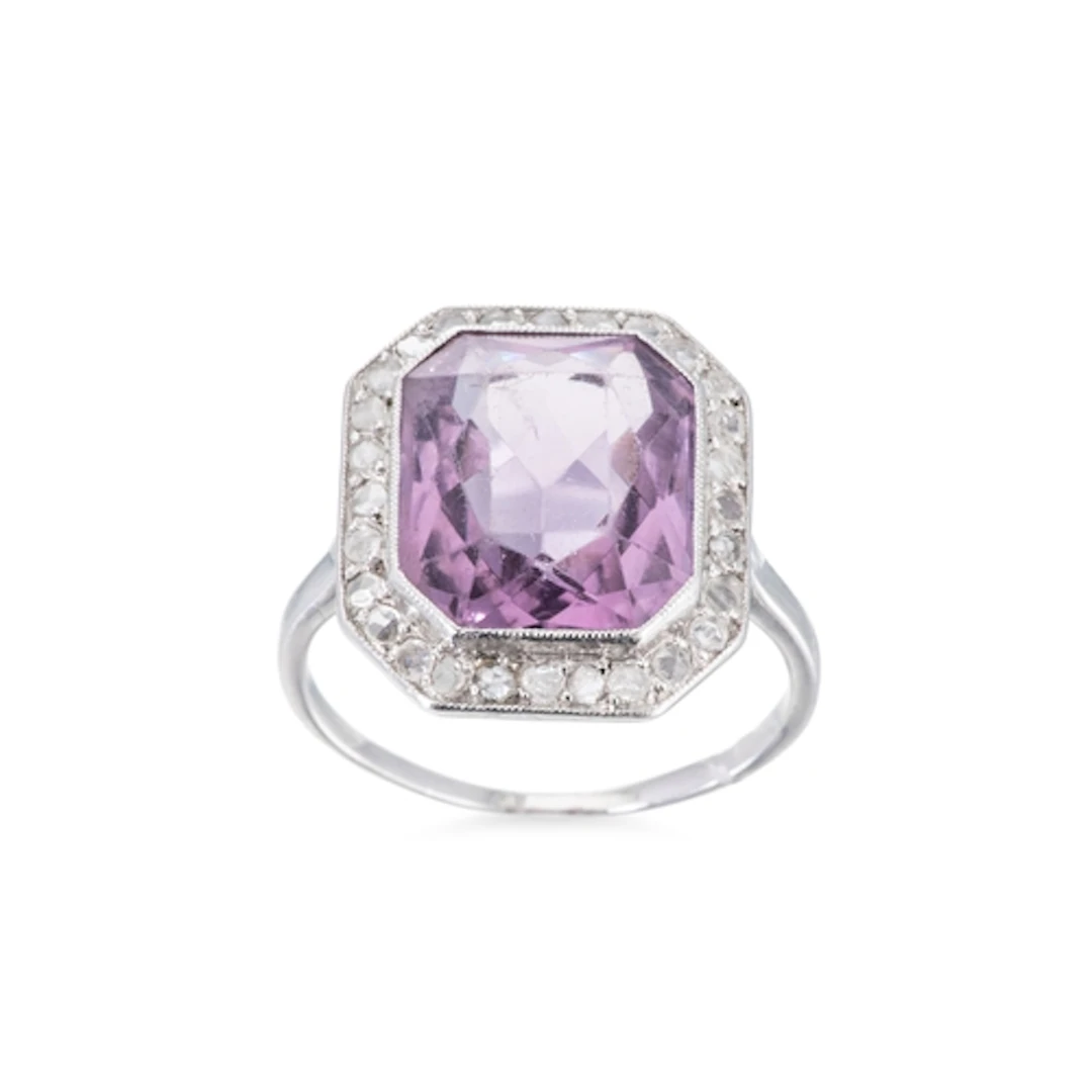 A VINTAGE AMETHYST AND DIAMOND CLUSTER RING, the rectangular...