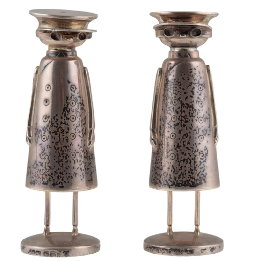A modern pair of novelty silver salt and pepper pots, modell...