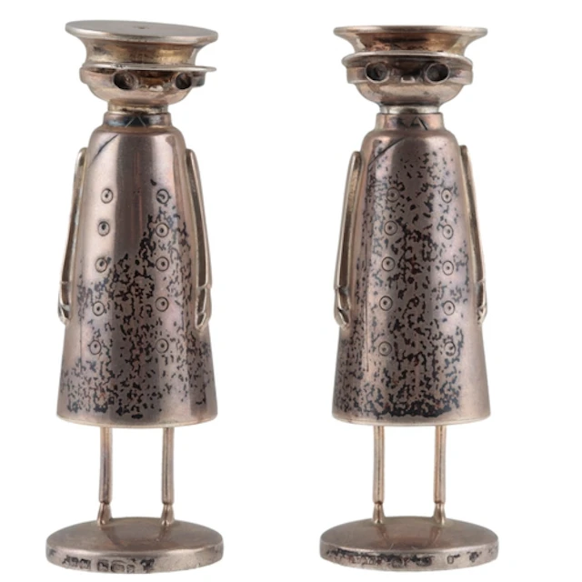 A modern pair of novelty silver salt and pepper pots, modell...
