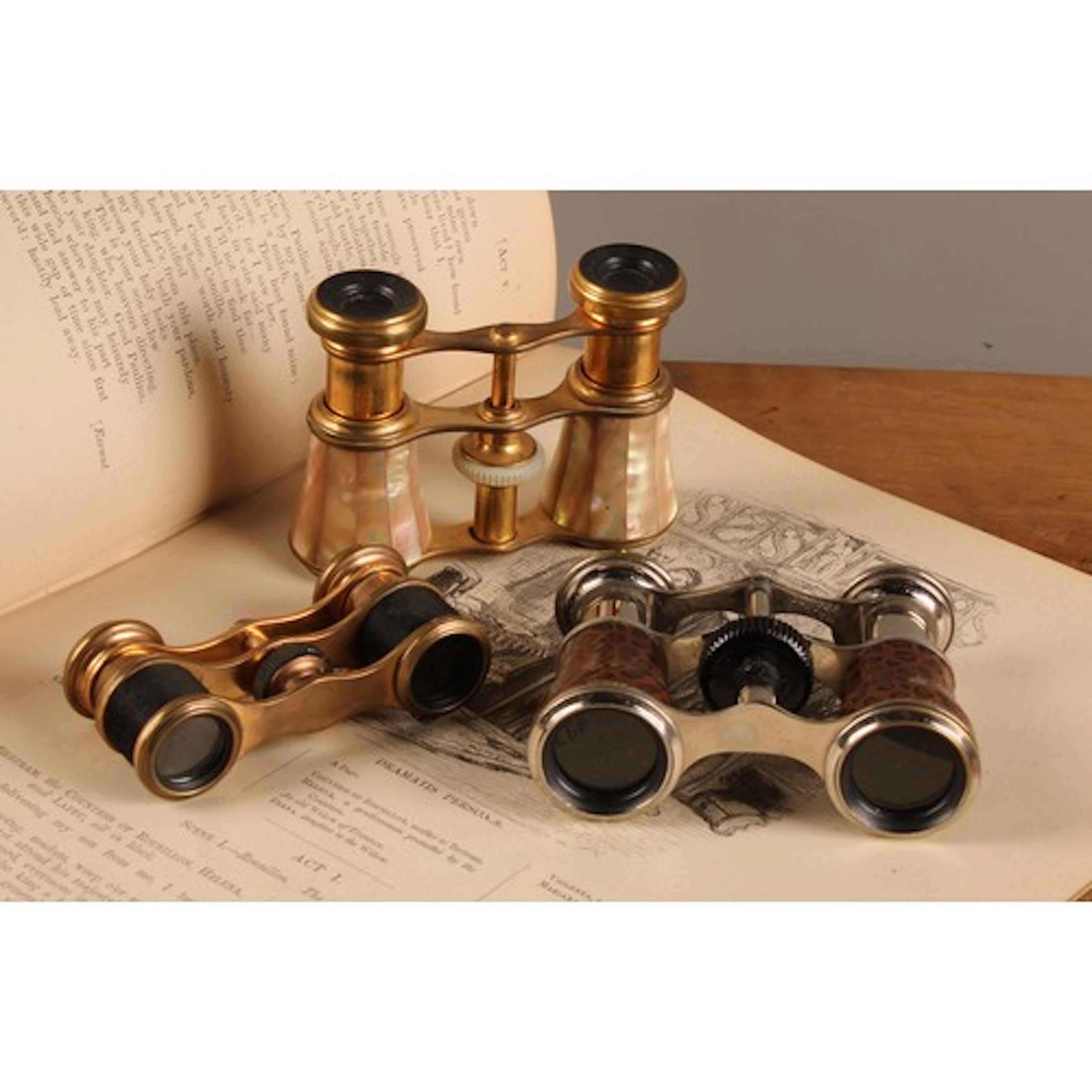 A pair of French mother-of-pearl opera glasses, by Iris of P...