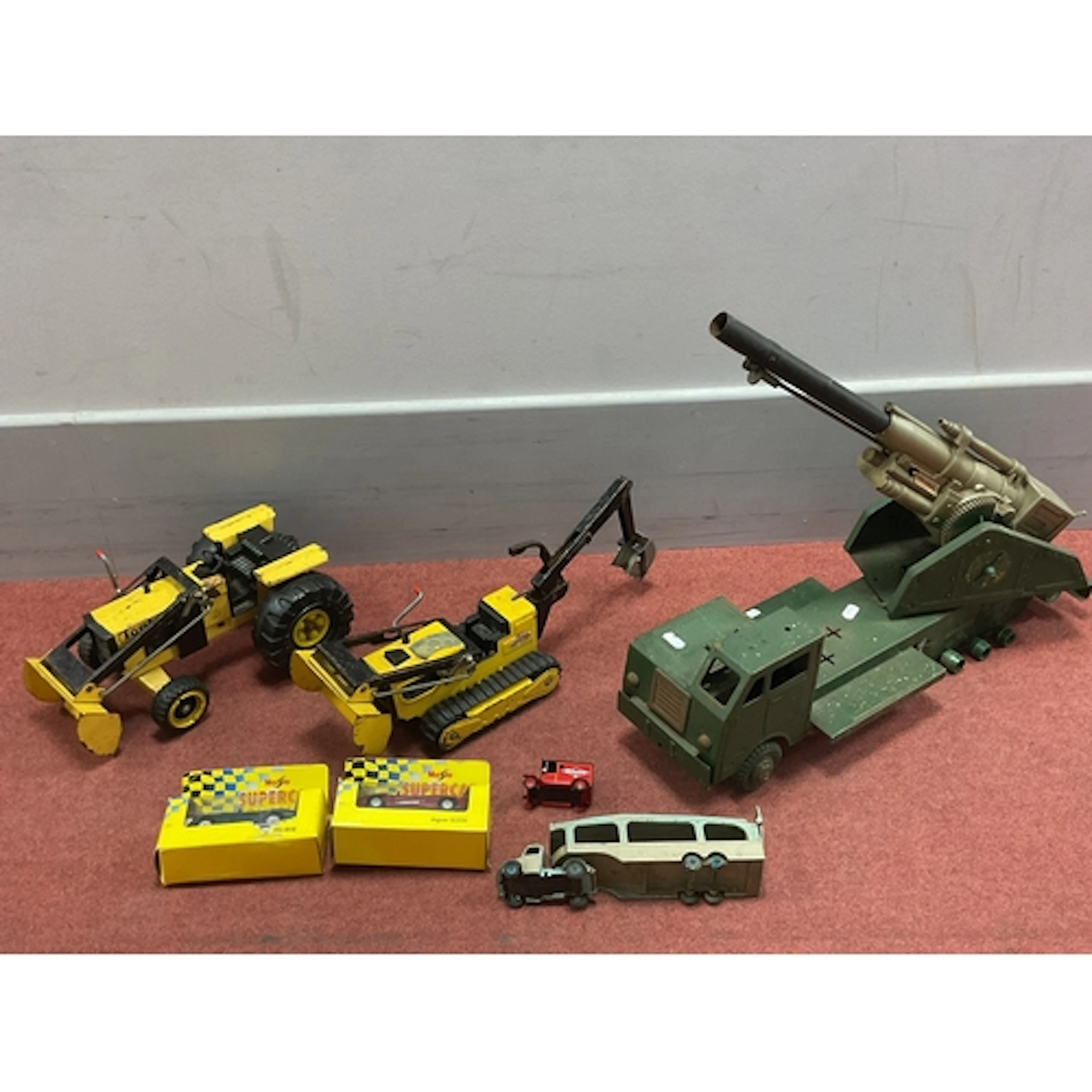 A Louis Marx 'Primers Tools' battery operated tinplate Mobil...