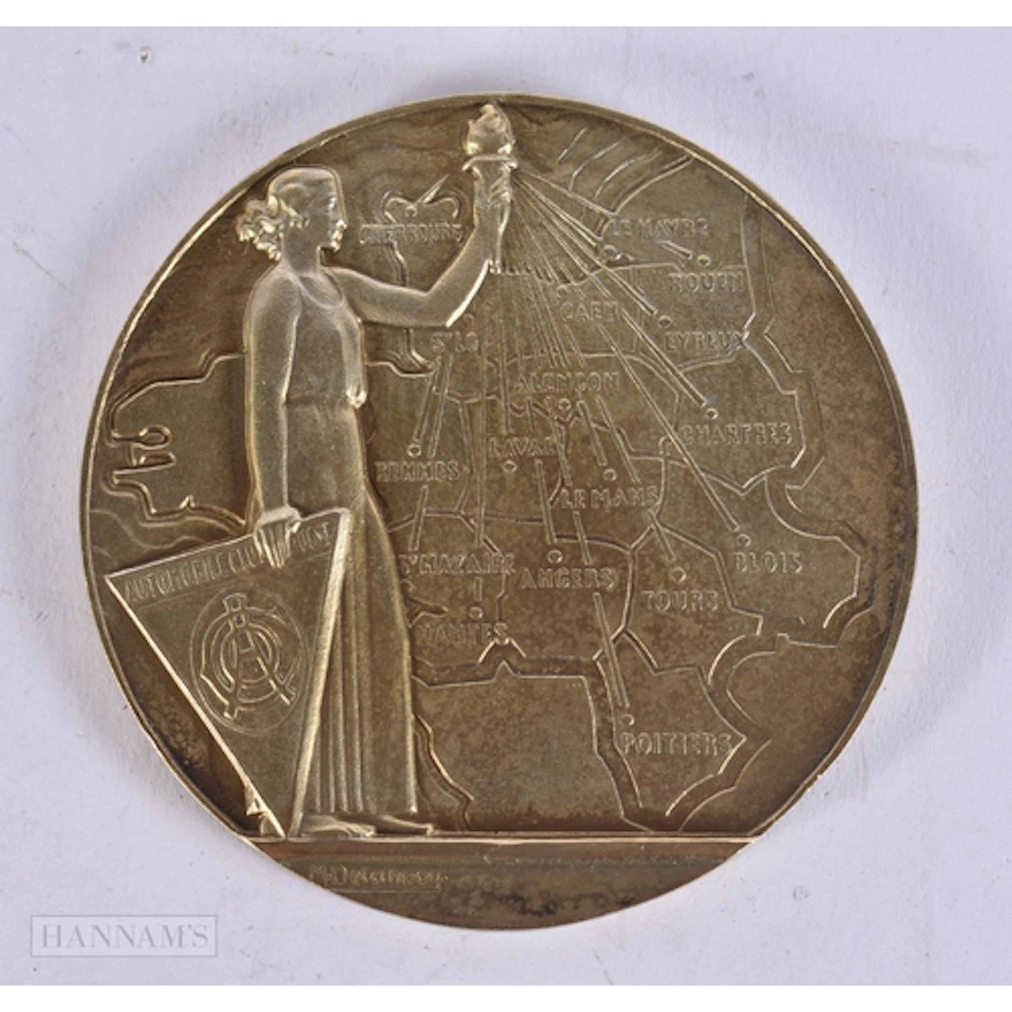 AN ART DECO FRENCH AUTOMOBILE CLUB MEDALLION by M Delannoy. ...