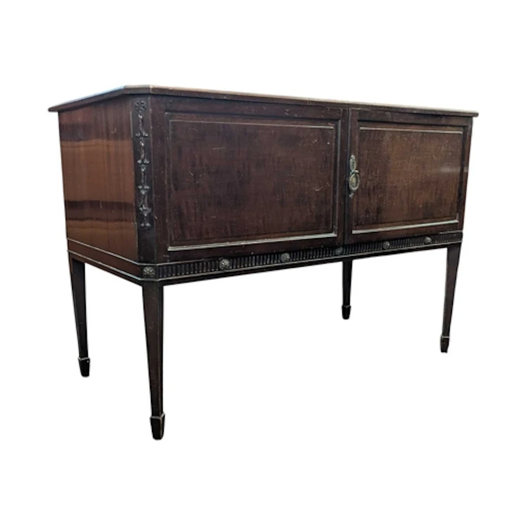 An Edwardian mahogany washstand cabinet. The washstand raise...