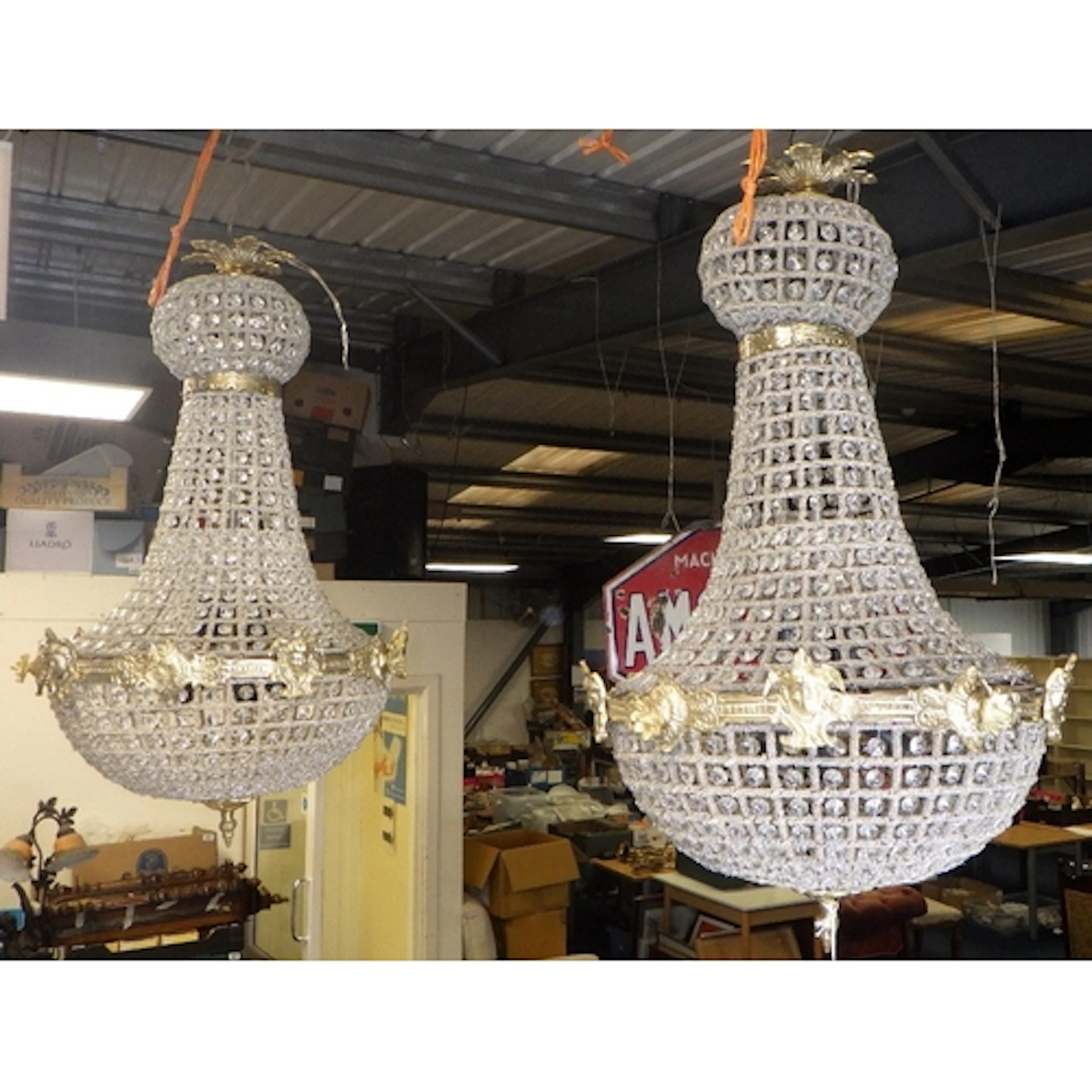 A pair of Empire style bag Chandeliers