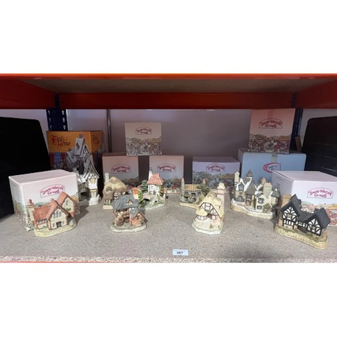 Shelf containing David Winter model cottages, etc.
