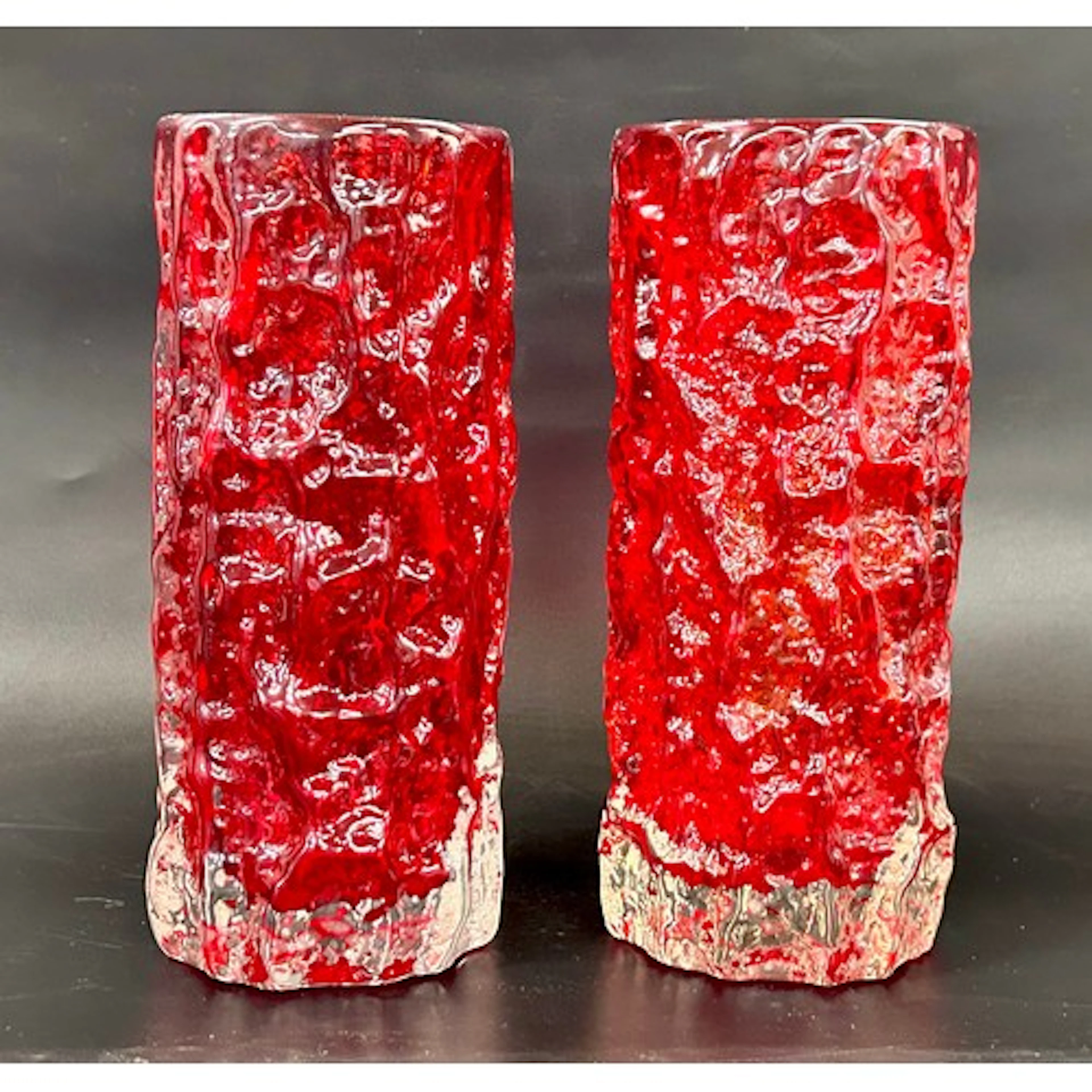 Geoffrey Baxter for Whitefriars; two textured glass Ruby Red...