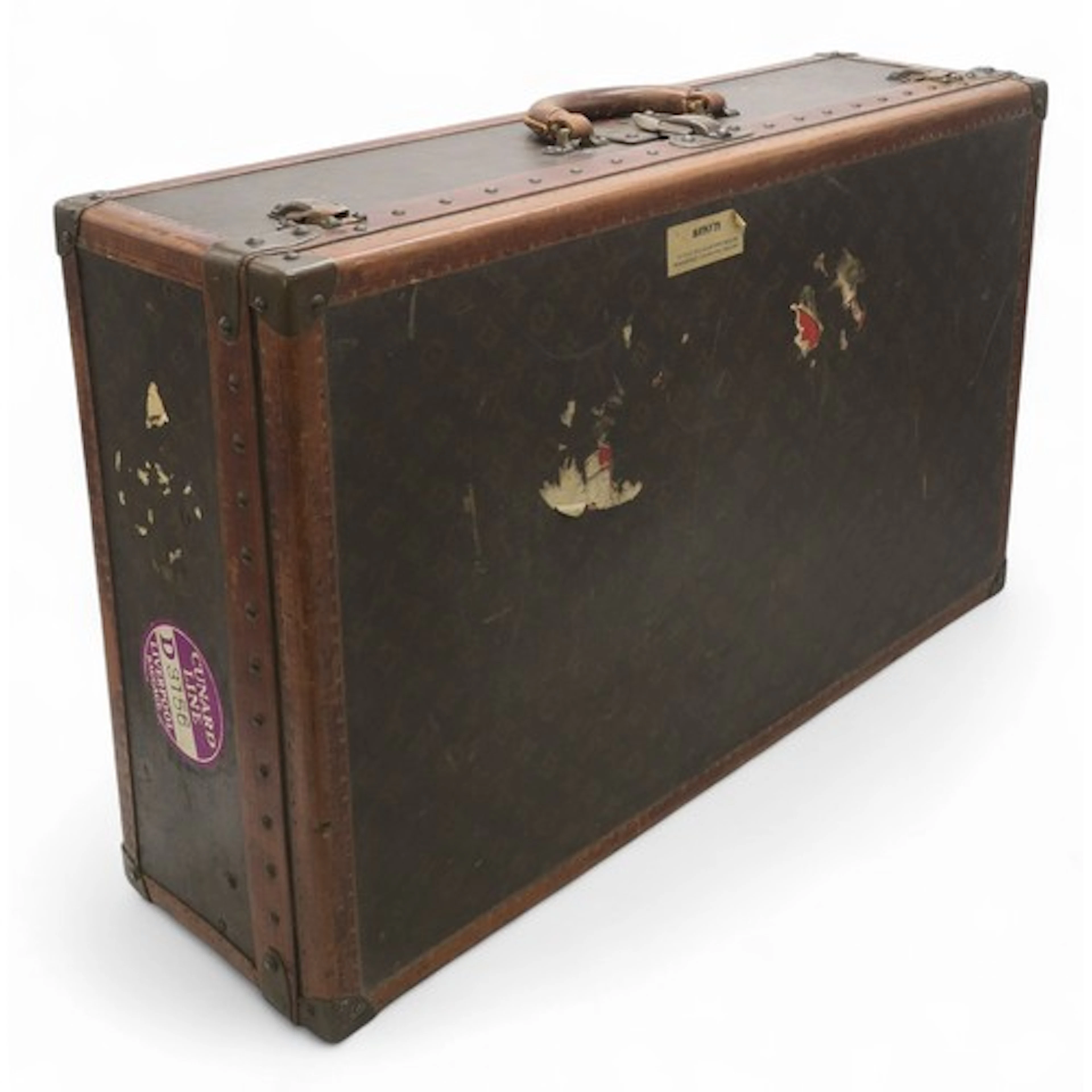 A VINTAGE LOUIS VUITTON MONOGRAM COATED CANVAS SUITCASE With...