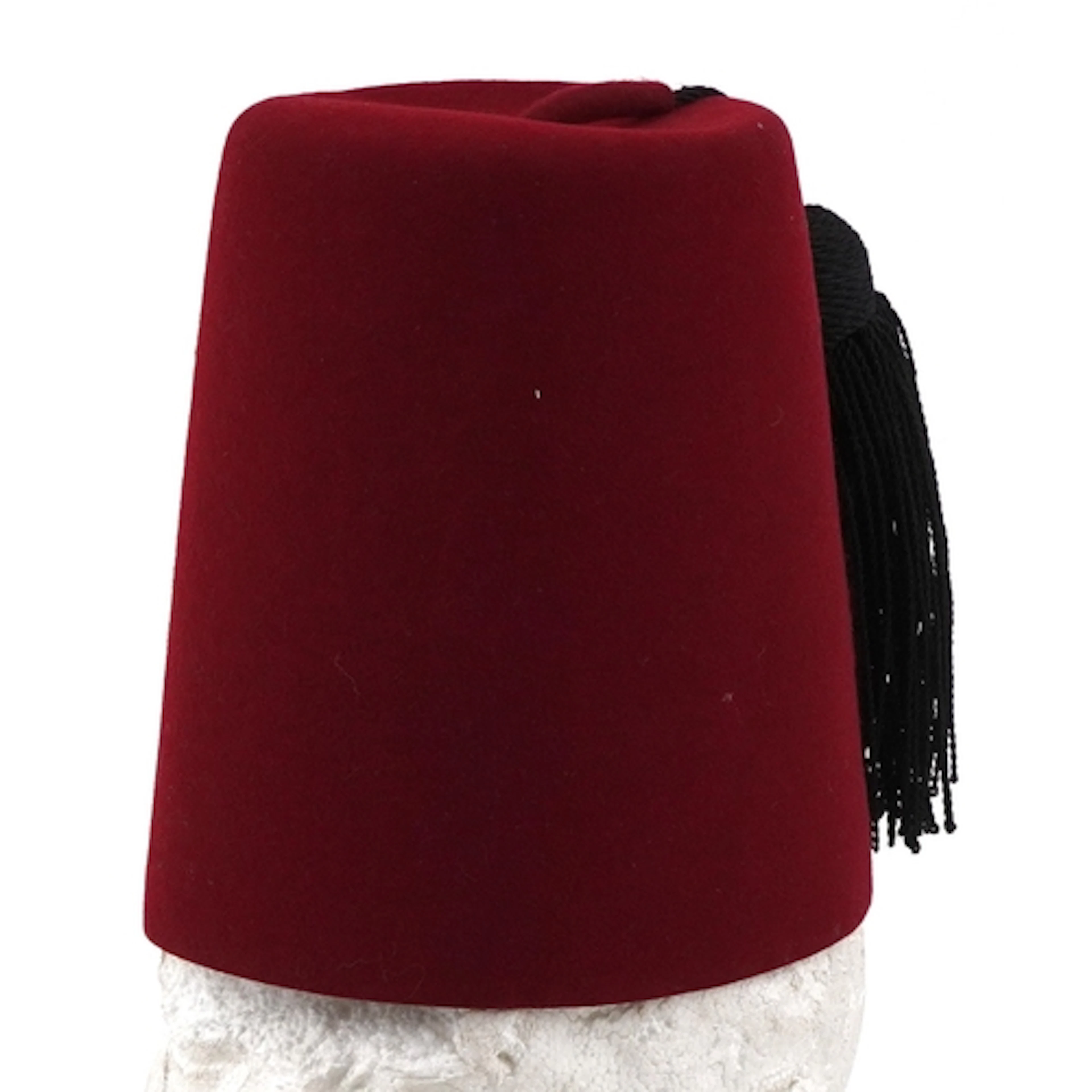 1960s red felt fez with long black tassel, leather sweat ban...