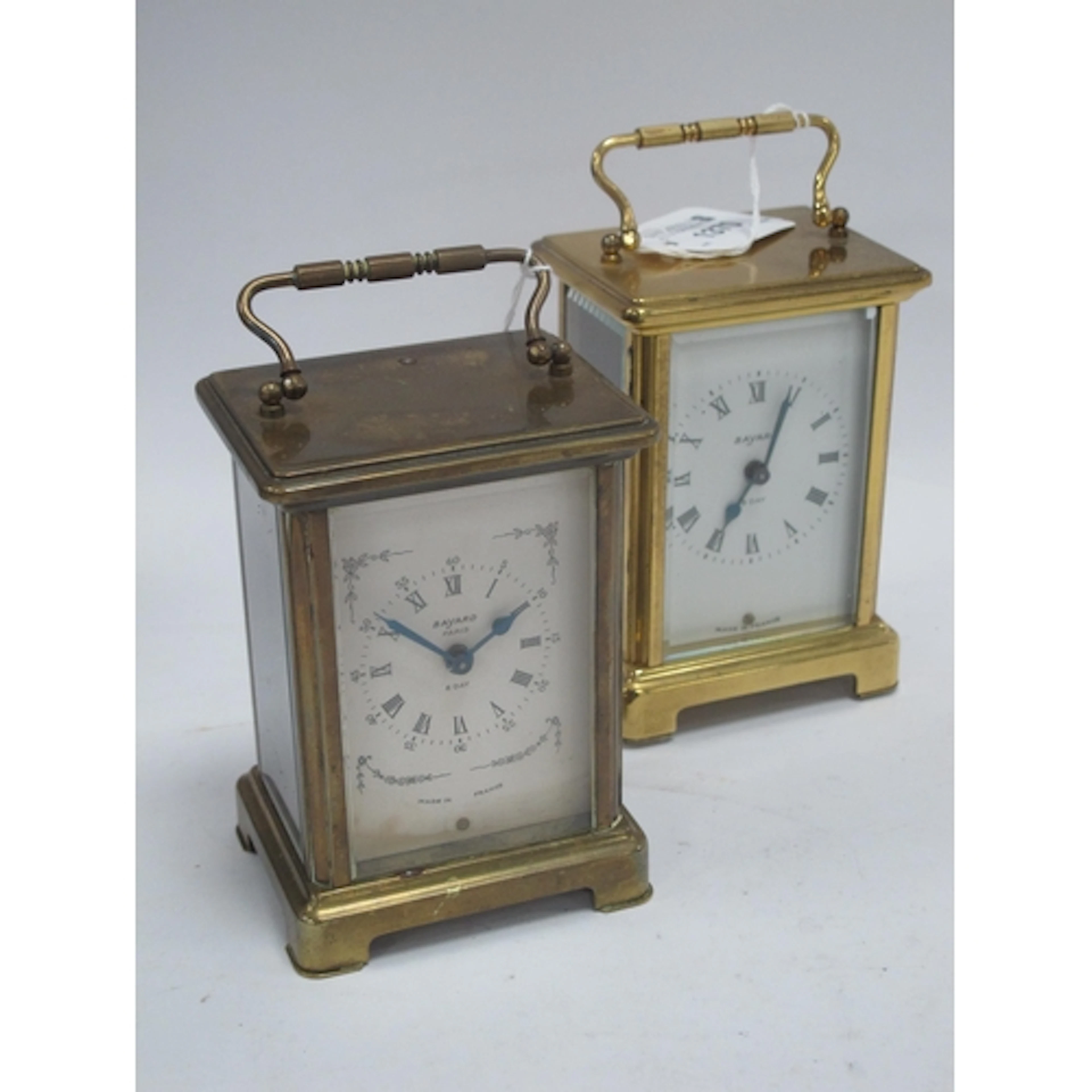 A pair of vintage French brass 8-day carriage clocks by Baya...