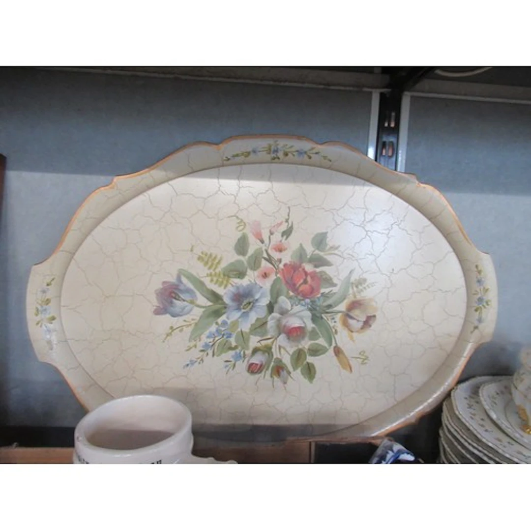 A Danish painted floral tray by Wiggois