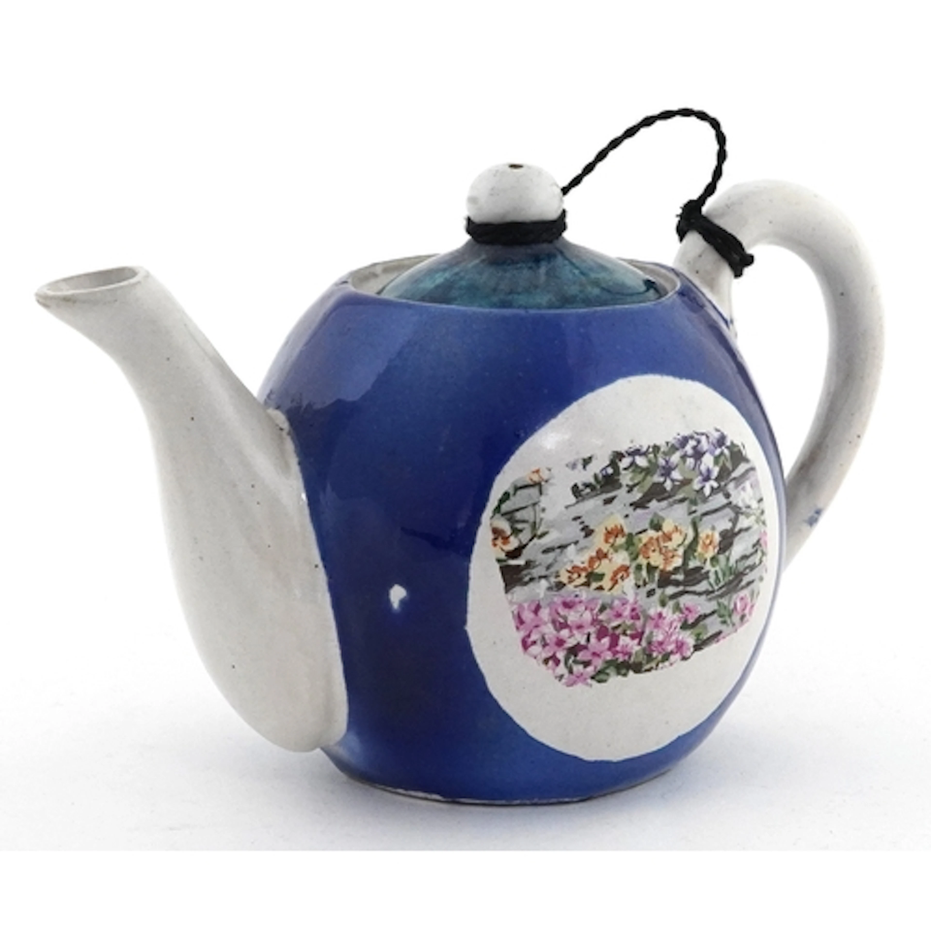 Antique Afghan porcelain teapot with floral decoration, 16cm...