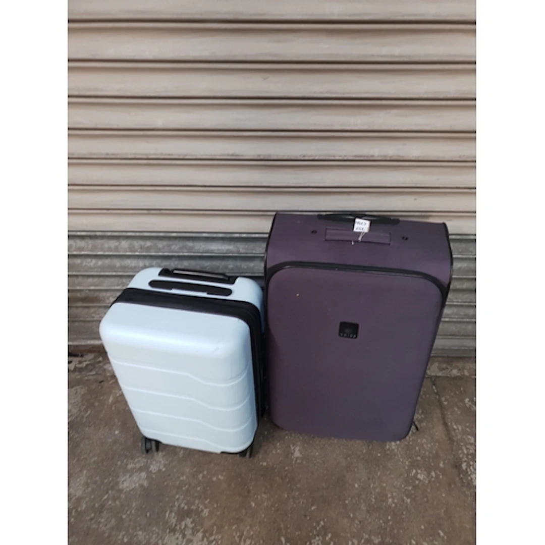TWO SUITCASES including Tripp Note: cases and bags are empty