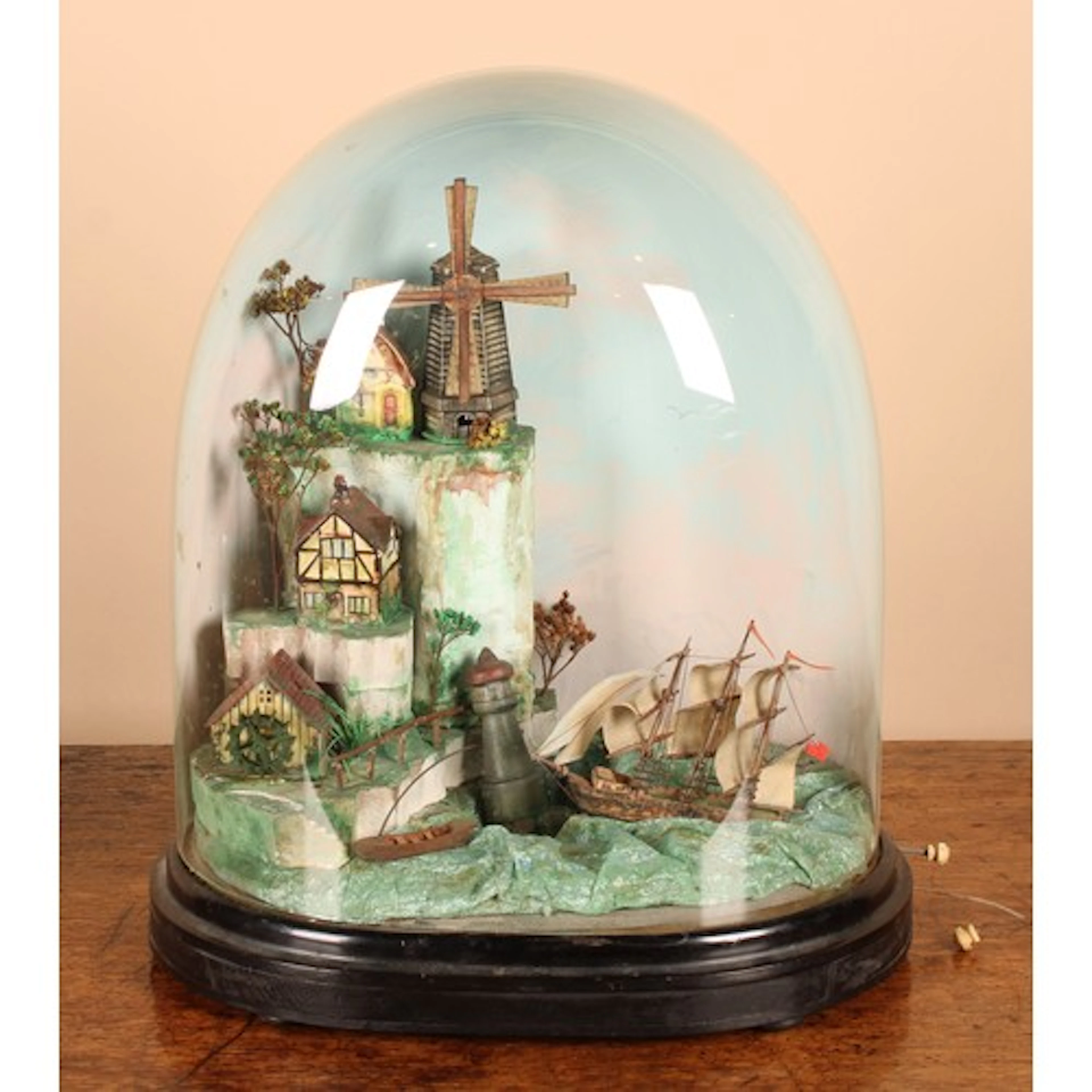 A 19th century folk art automaton diorama, depicting a naval...