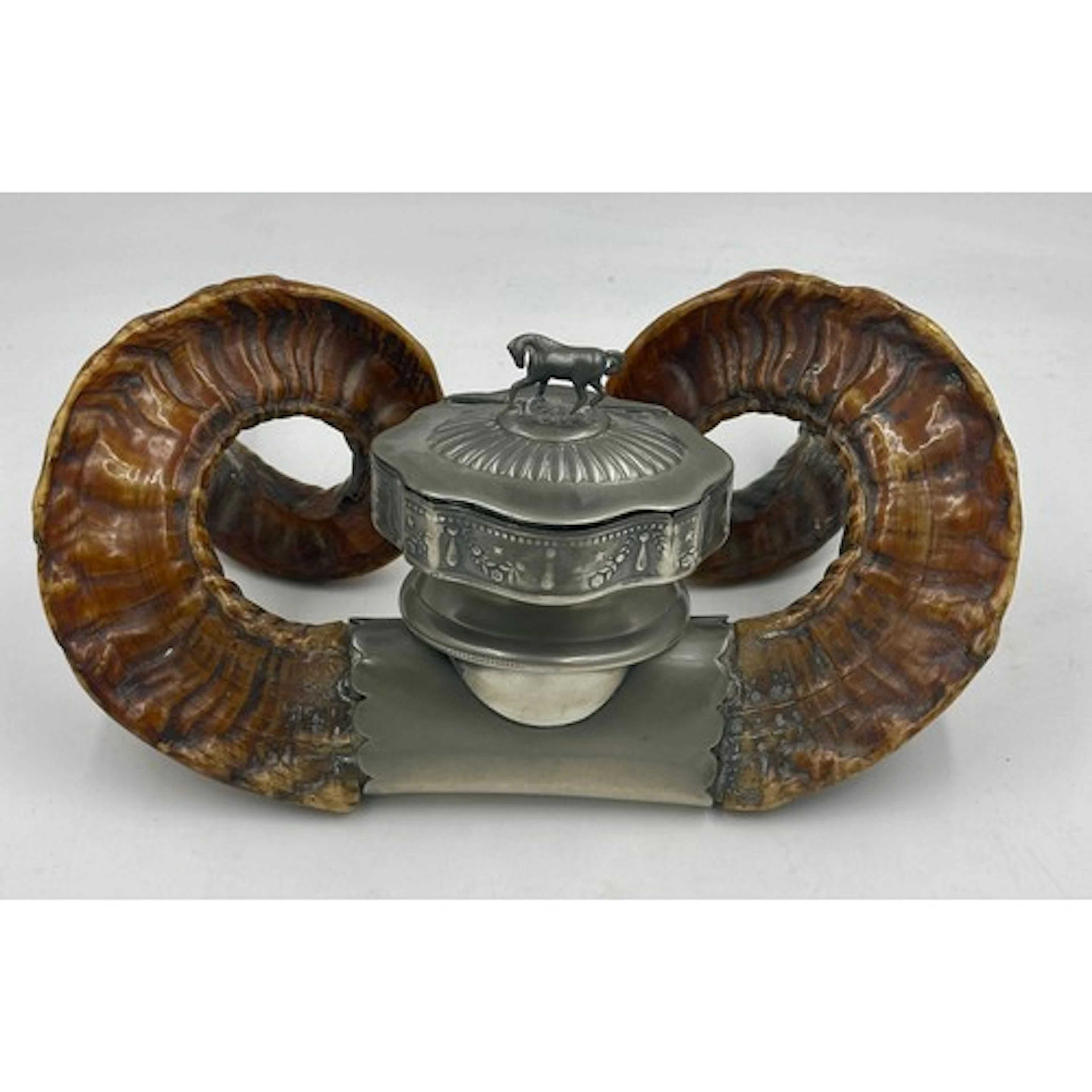 An early 20thc pewter rams horn table snuff mull 34.5cm w.