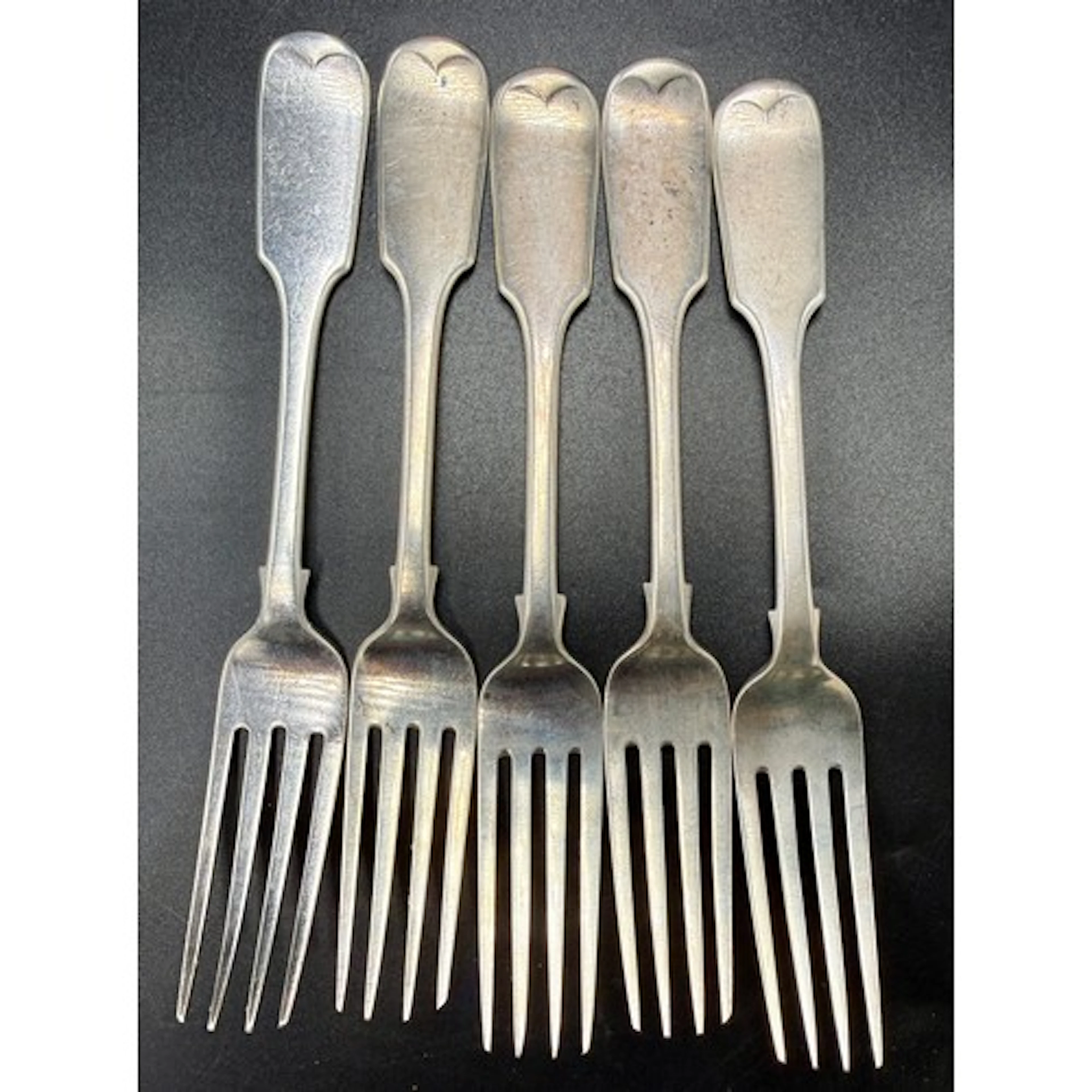 Four Victorian silver forks. London 1860. Maker Samuel Hayne...