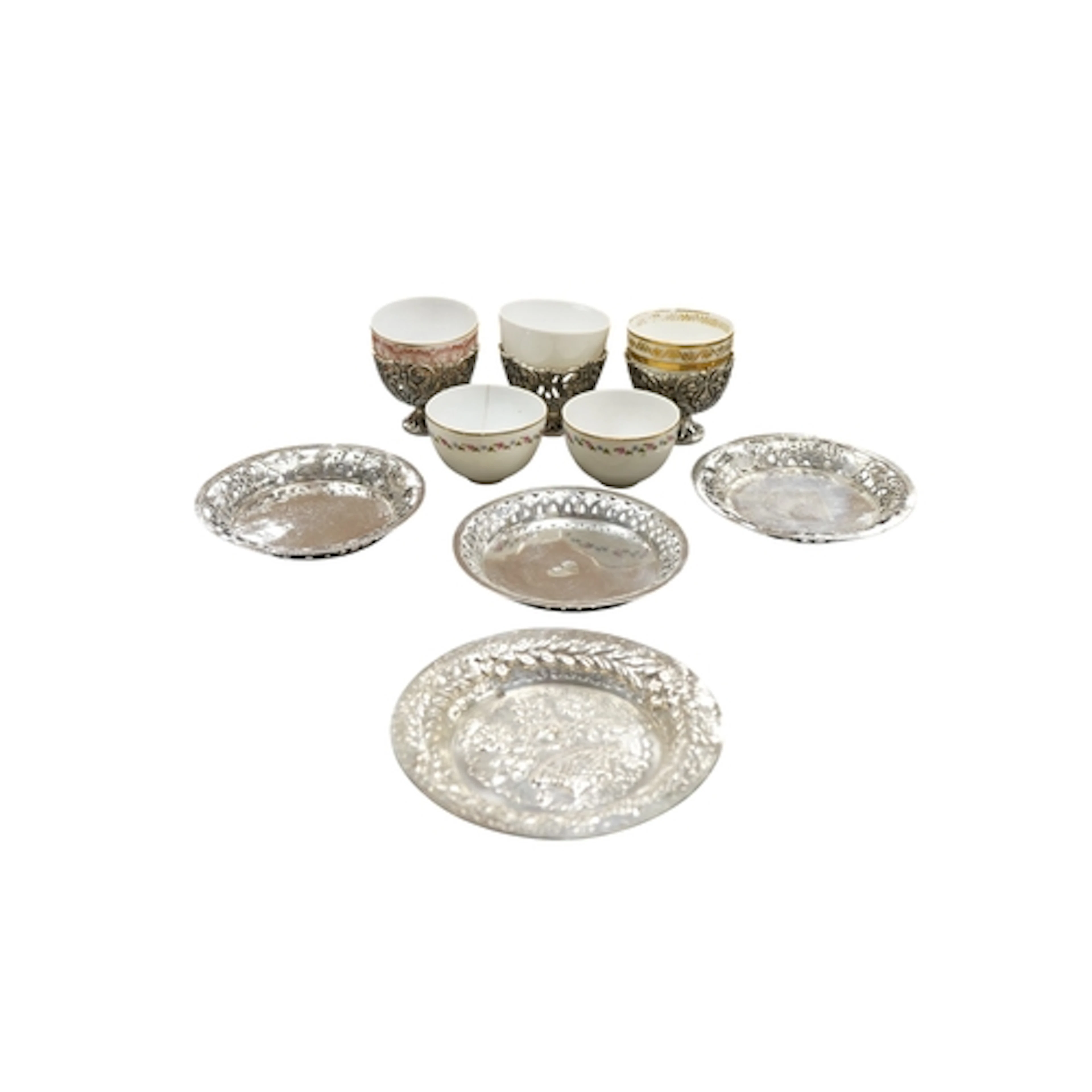Three Turkish pierced white metal zarf holders, height 45mm ...