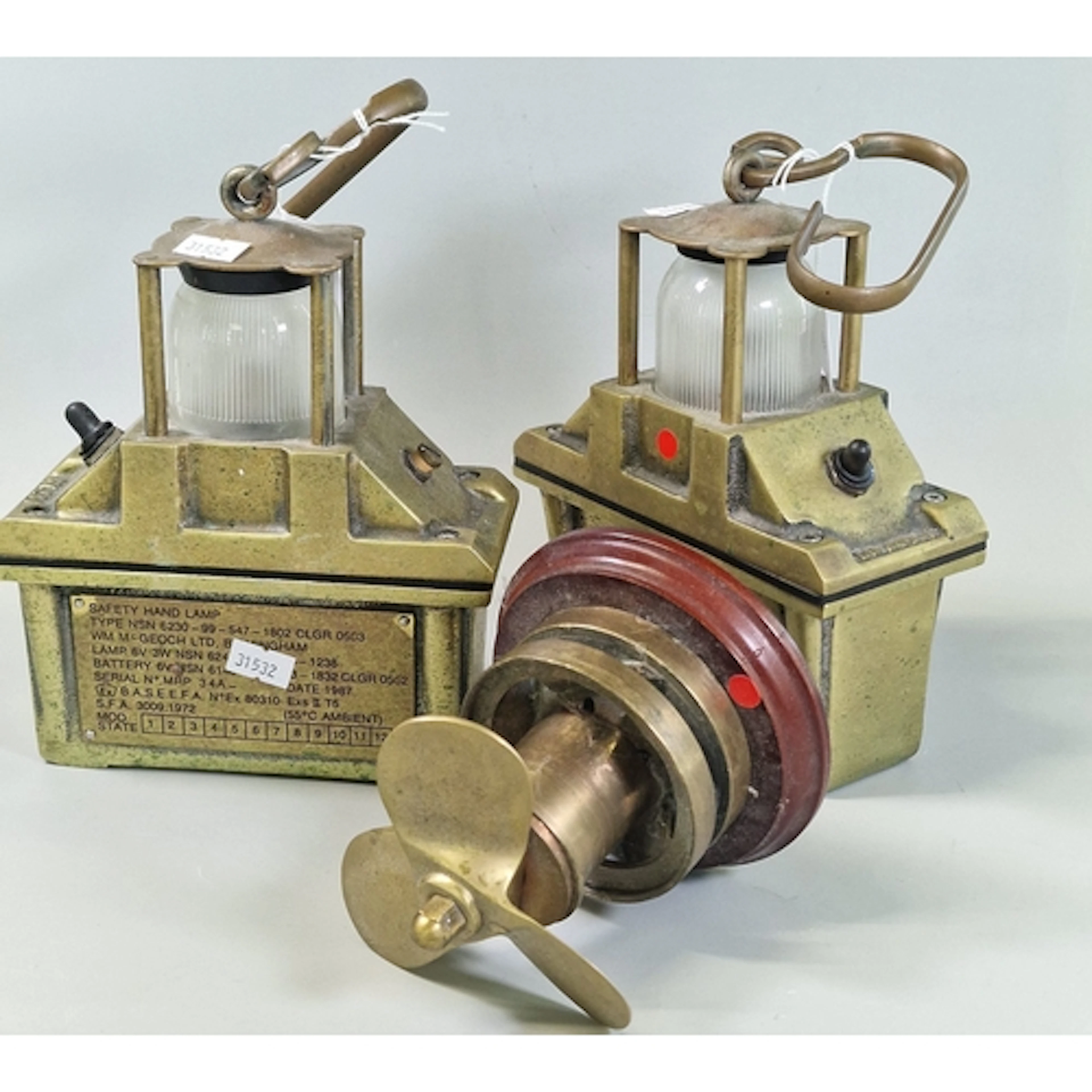 Pair of brass explosion proof safety hand lamps marked BM286...