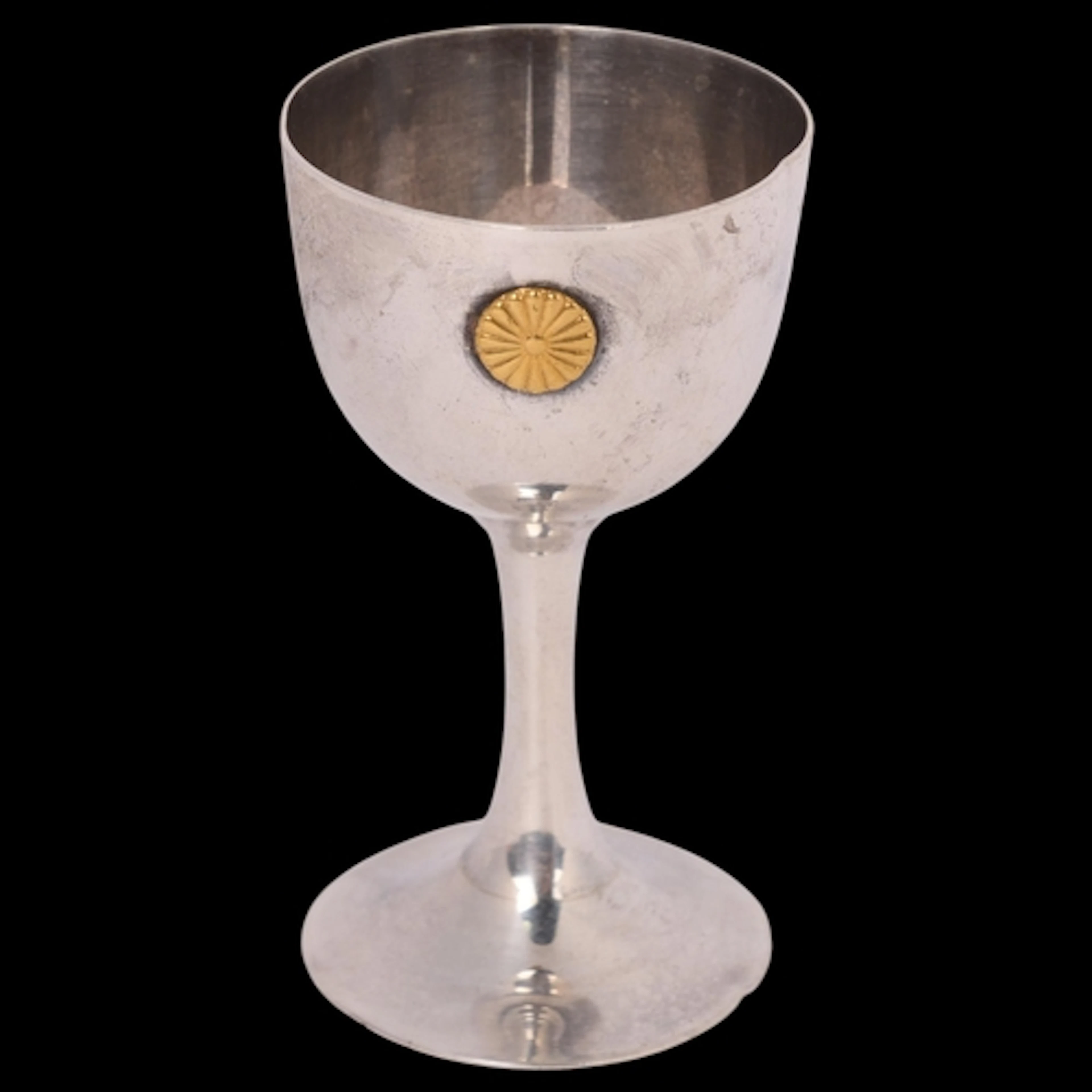 A Japanese silver Sake cup, with applied gold flowerhead bos...