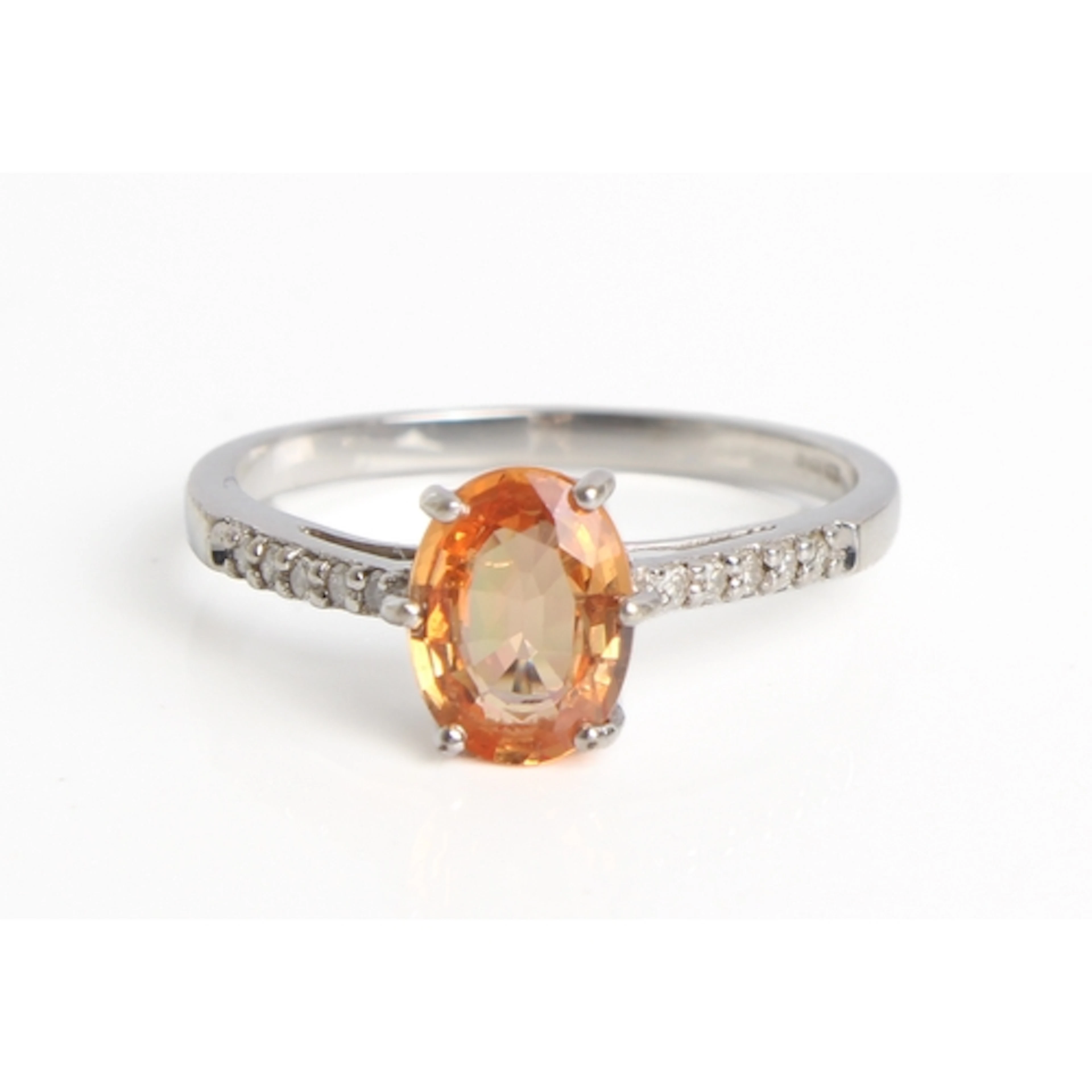 A 9ct white gold, orange stone and diamond ring - Birmingham...