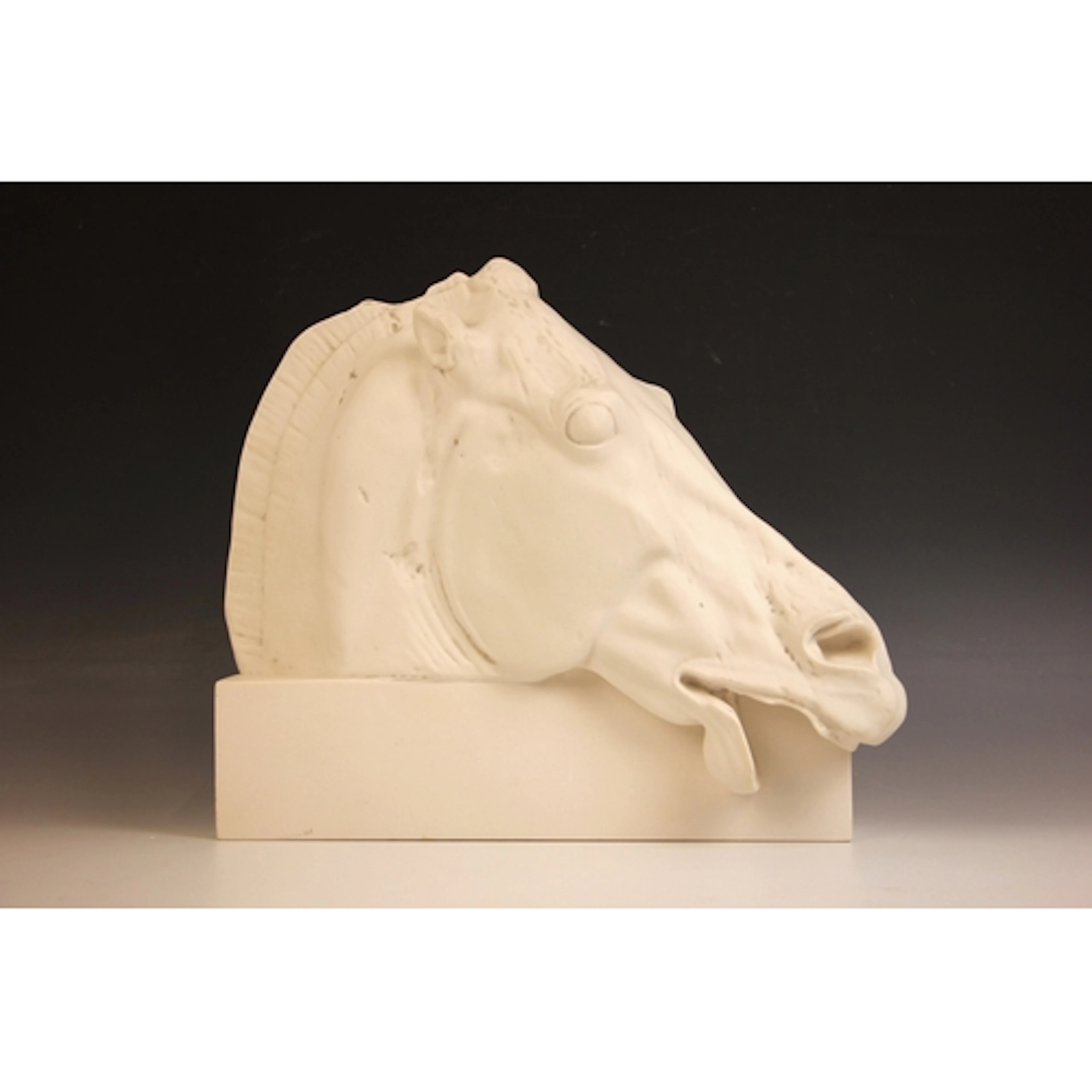 After the antique, a cast composite resin replica of the hea...