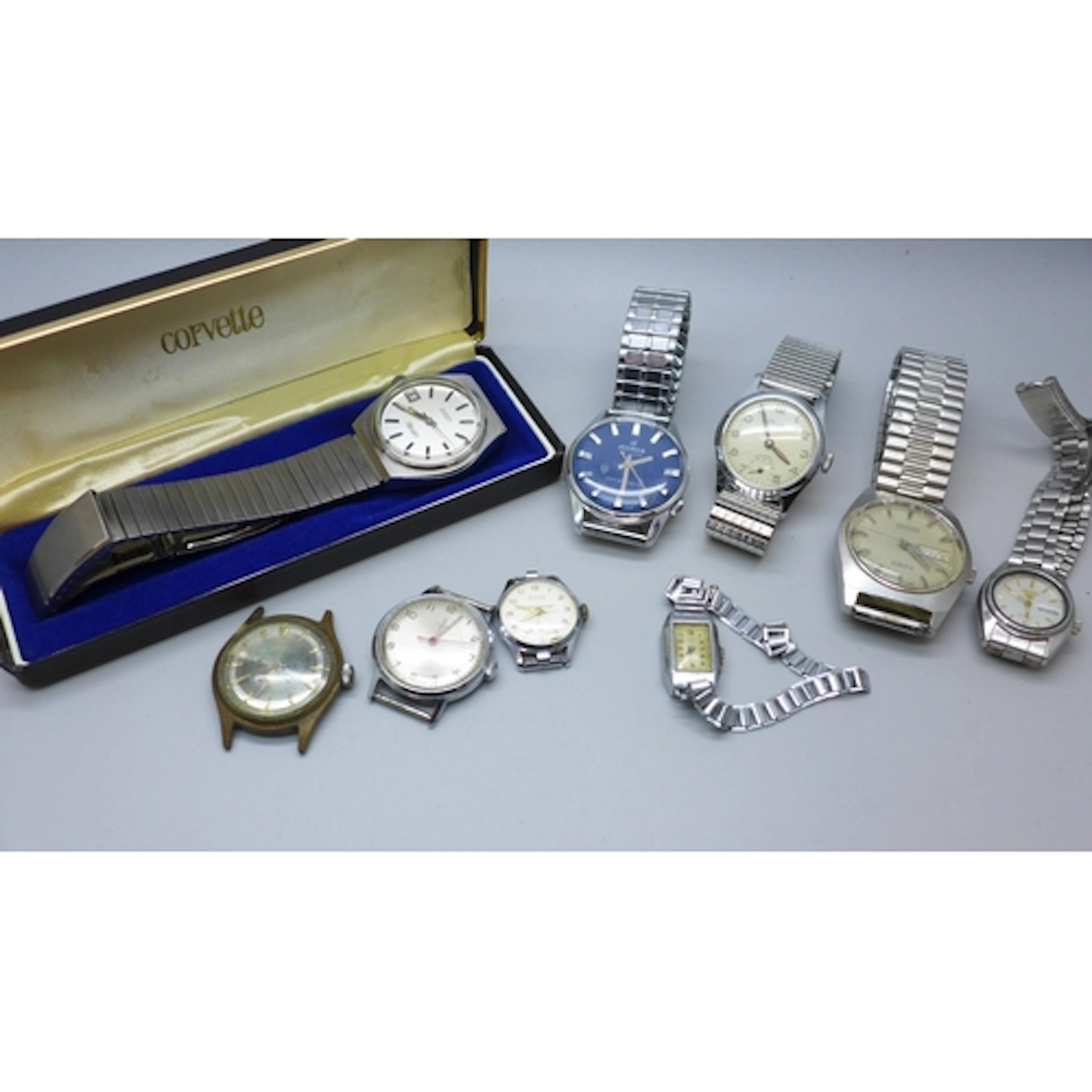 A collection of mechanical wristwatches including a Corvette...