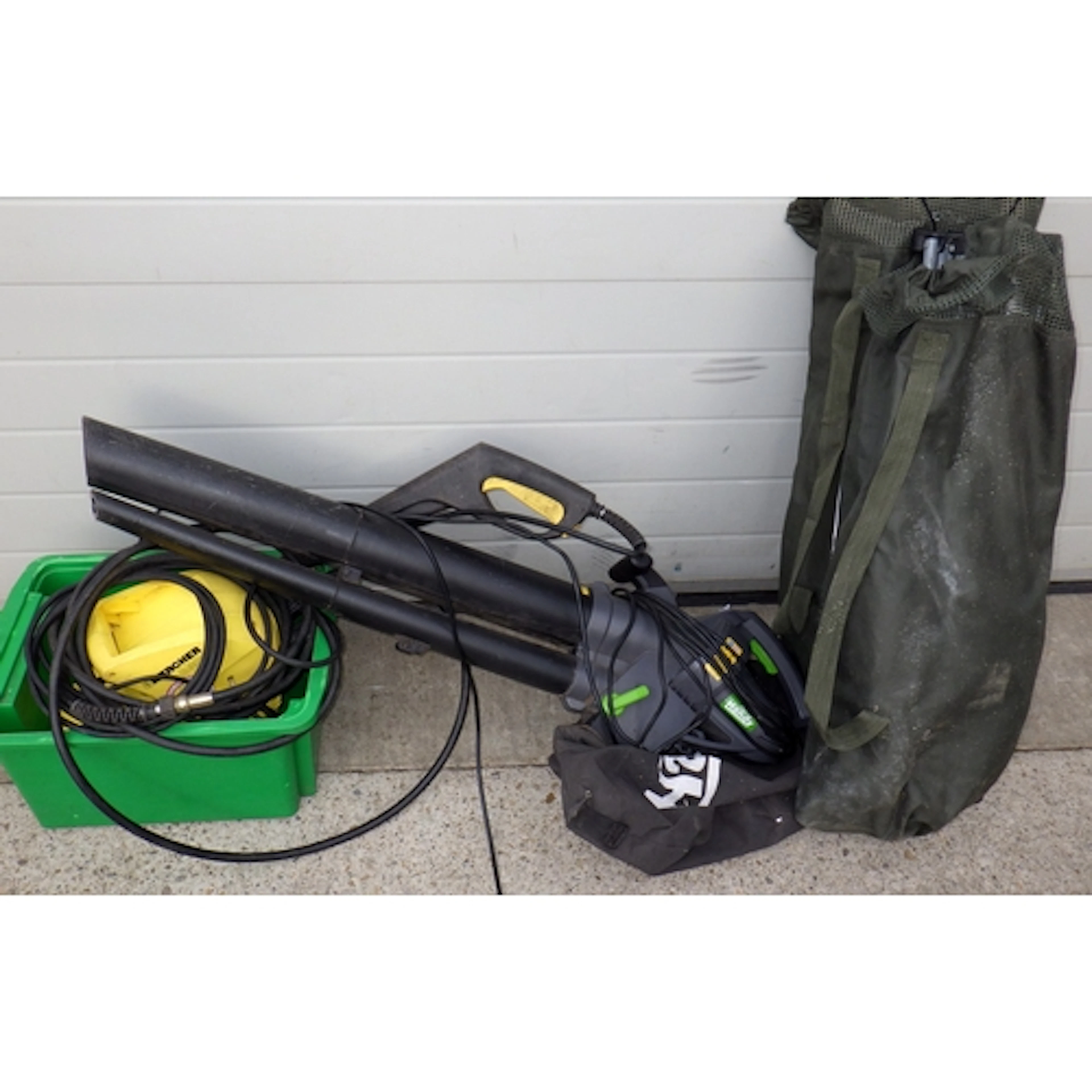 A Karcher pressure washer, leaf blower and two chairs