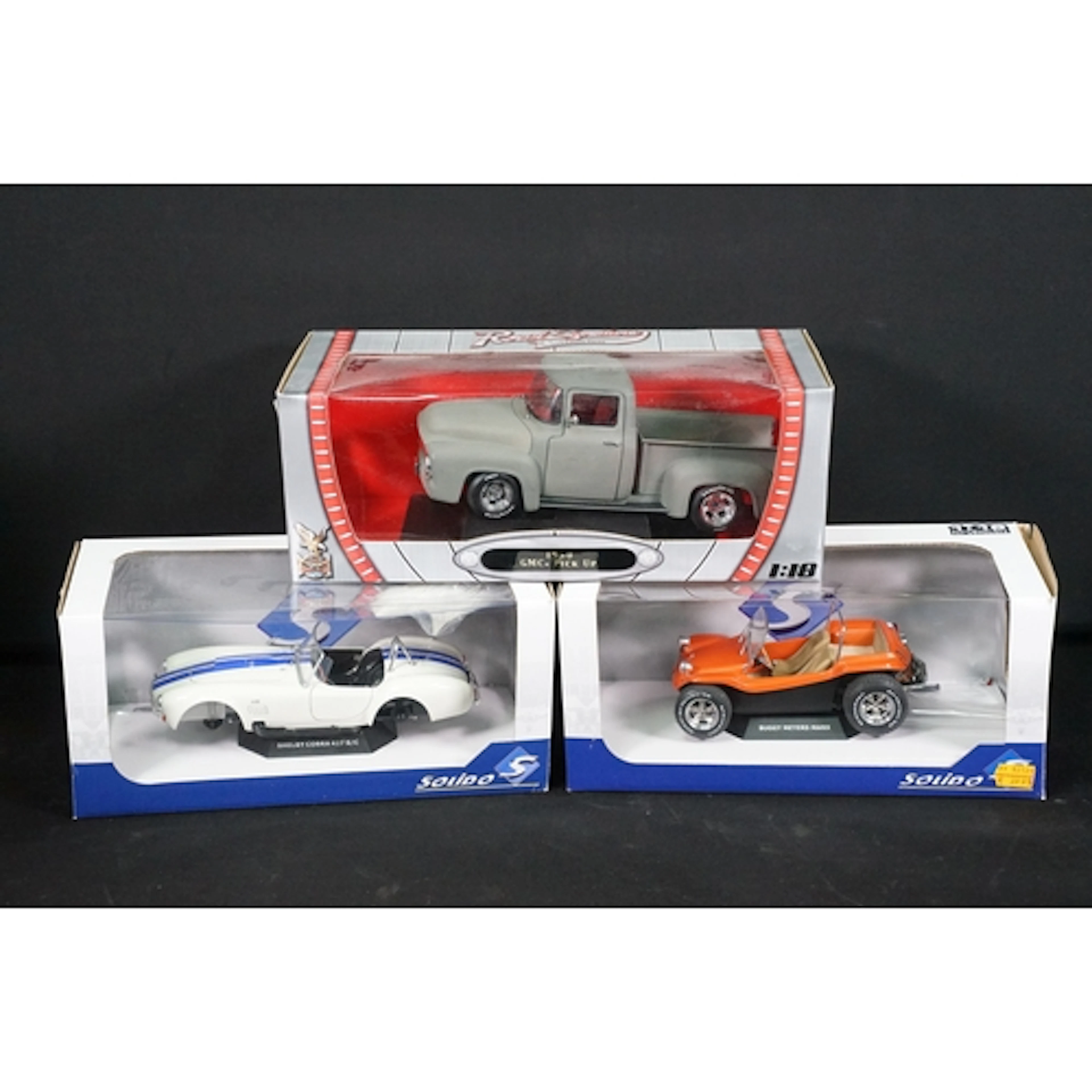 Three boxed 1/18 diecast models to include 2 x Solido (Shelb...