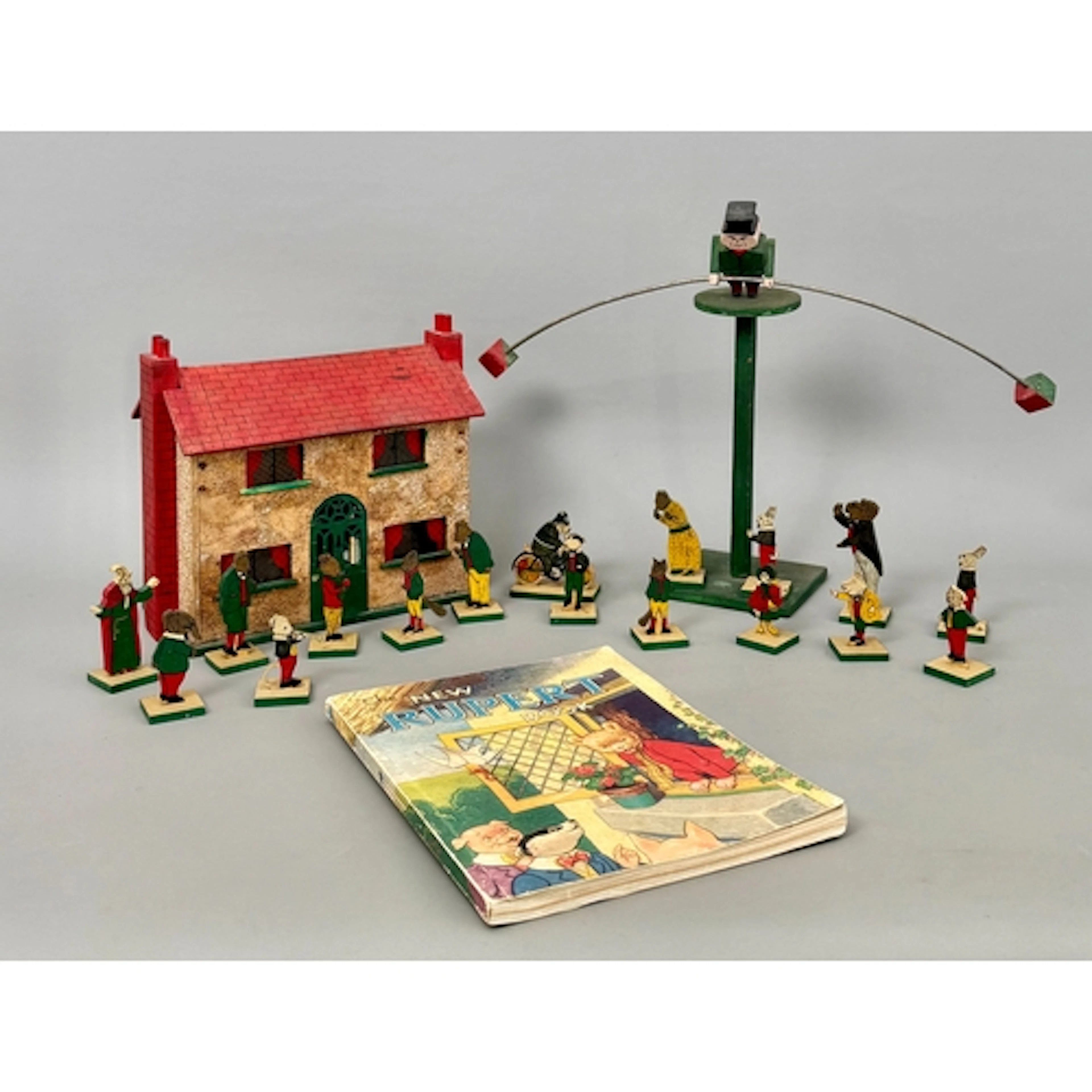 A vintage set of 1950s Rupert The Bear wooden figures - the ...